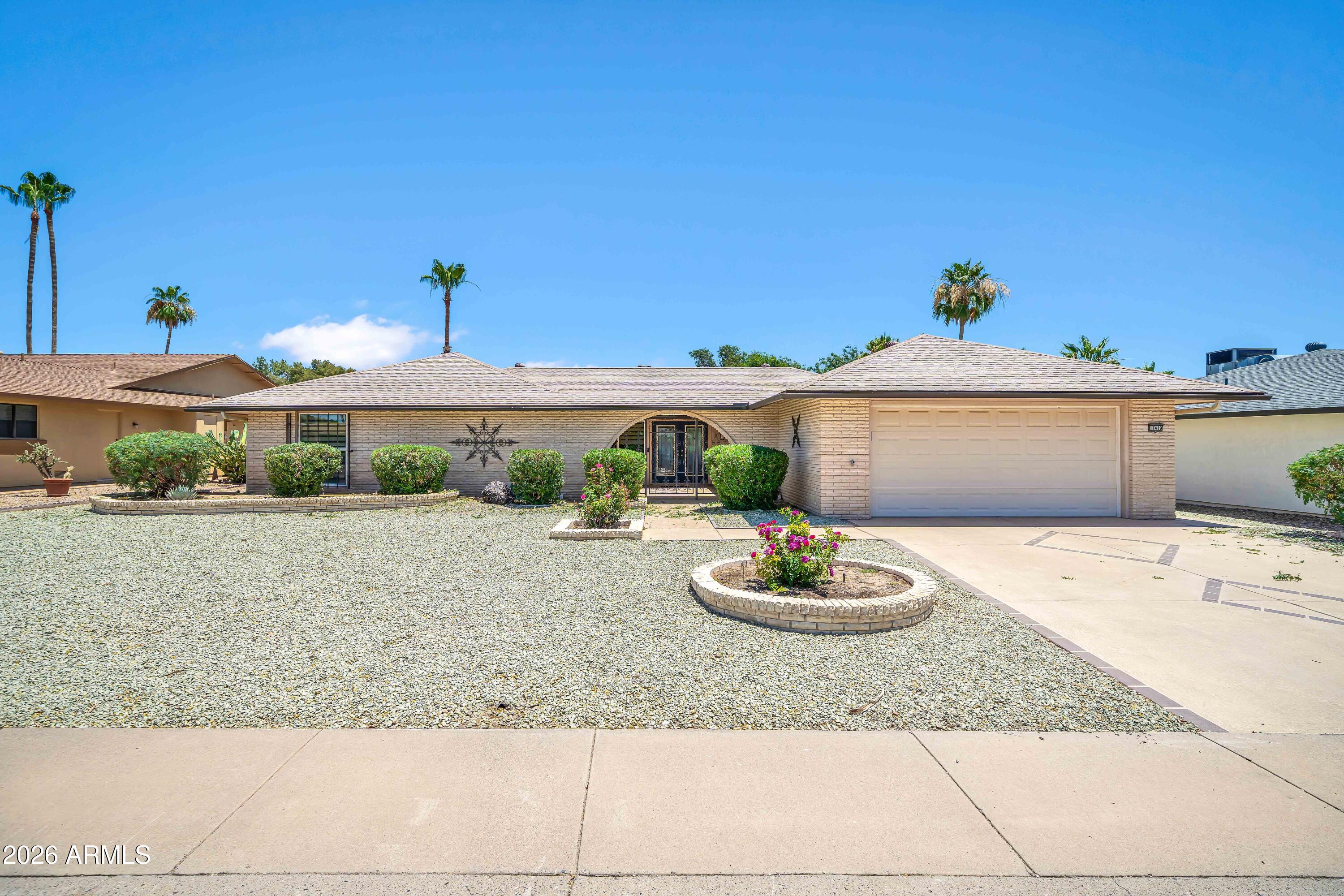 Modified Castillo model,3 bedroom 2 bath home 2596 sq. ft. that is highly updated on a beautifully landscaped Golf Course lot on Pebblebrook Golf Course in Sun City West, AZ. This home has a spacious Kitchen with updated custom cabinet, newer appliances granite counter tops and a large walk in pantry. The home also includes a formal living room, dining room and a spacious family room. The primary bedroom is split and has a large walk-in closet. The primary bath is highly updated with a large tiled walk in shower, new cabinets with ample storage and counter top with double sinks.  Bedrooms 2 and 3 are spacious and both have walk in closets.   The home has a large covered patio in the back. This is truly a one of a kind home that you have to see.