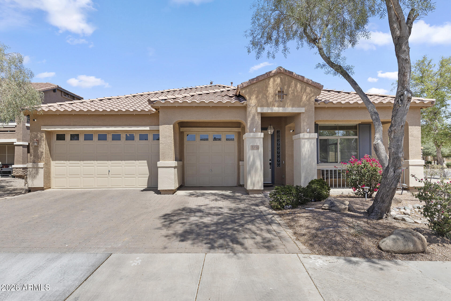 Large corner lot, leased solar, and room for everyone - this home truly has it all! Spacious 4 bed, 2 bath home offering an impressive 2,531 sq ft of living space on an oversized 8,215 sq ft corner lot! Step inside to soaring vaulted ceilings and elegant tile and wood flooring. The kitchen features granite countertops, a pantry, and plenty of prep and storage space. The primary suite includes a full bath with double vanity, walk-in closet, and ample room to relax. Outside, the beautifully maintained yard is easy to care for and includes an RV gate for added flexibility. The 3-car garage offers built-in shelving and a separate exterior entry - perfect for storage, hobbies, or additional workspace. Solar for energy efficiency and an unbeatable combination of upgrades and functionality.