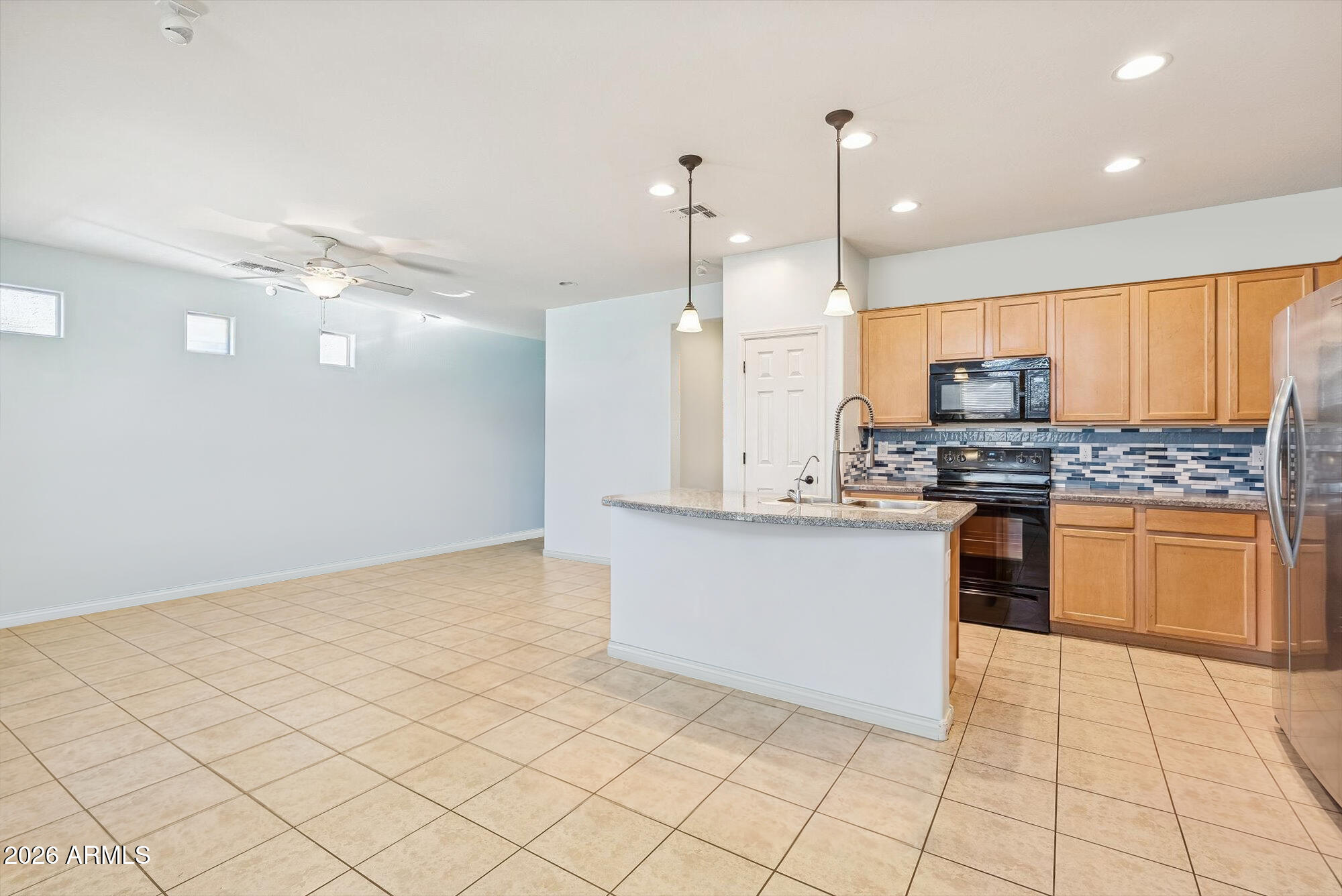 A true turn key home - just steps from the clubhouse and lake in this gated adult community! This light-filled home features an open split floor plan, a granite kitchen with a large island, and an oversized secondary bedroom perfect for an office or hobby space. Enjoy your morning coffee on the charming front porch, then relax out back with ravine views, mature greenery, and a private putting green. Love to travel? The fully enclosed patio with powered, weatherproof screens lets you lock up and go with total peace of mind - comfort and convenience all year long! The icing on top? The incredible neighbors the sellers are sad to leave behind.
