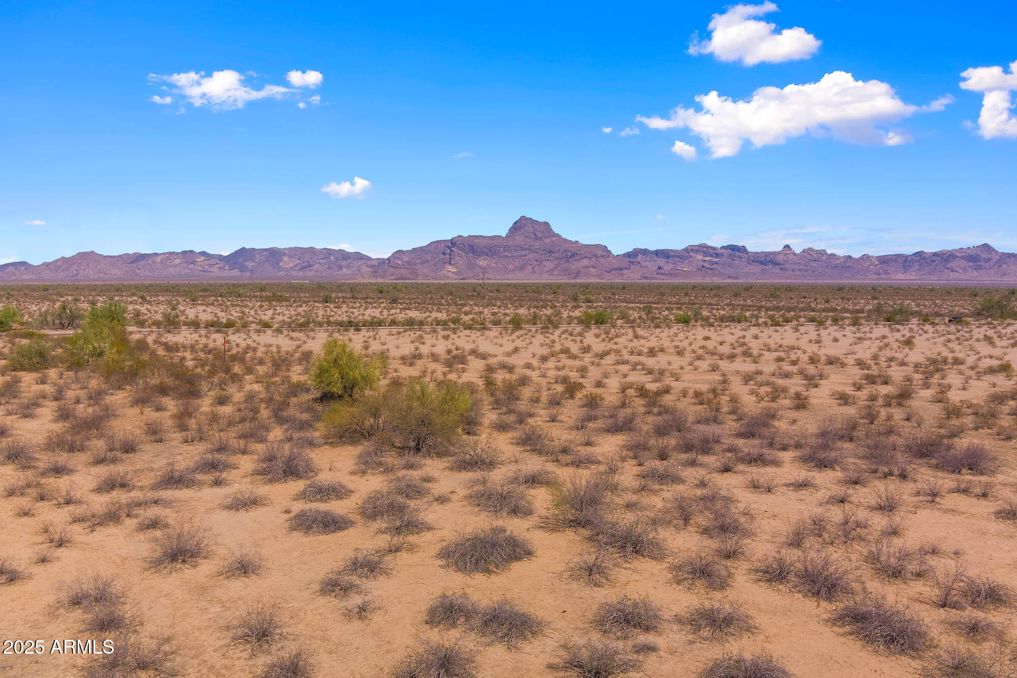 Prime 19-Acre Industrial Site | Fiber + Power + Proximity | Harquahala Plains, AZ

Strategically located 3.5 miles from Salome Hwy and 16 miles from APS's Delaney Substation, this 19-acre flat, developable parcel is engineered for immediate industrial use. Situated in a proven utility corridor with full fiber-optic frontage and positioned within an INA water district, this is not speculative land—it's a future-proof industrial platform ready for hyperscale data, renewable energy, or advanced manufacturing operations.

Zoned for utility-scale infrastructure and just 3 miles from the proposed NextEra substation and solar project, this site offers built-in scalability and long-term value. Direct access to I-10 and Phoenix provides critical logistics advantage, with 25,900+ daily vehicle traffic ideal for 3PL, fulfillment, or mission-critical operations.

Buyers won't chase this. Builders will. This is strategic landutility-backed, infrastructure-ready, and primed for execution.