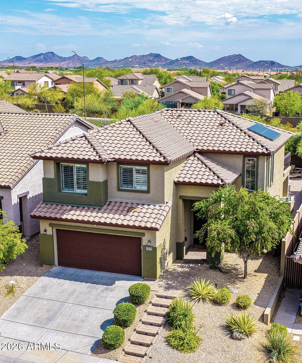 This home checks all the boxes. It's a 10 out of 10 and you'll feel it when you walk through the door. Featuring 4 bedrooms, 3 baths, with all 4 bedrooms upstairs, a cozy fireplace, pre-wired surround sound, granite countertops, and a spacious primary suite with private balcony access. The backyard is made for Arizona living with a covered patio and sparkling pool. Owned solar, fresh exterior paint a long with a new water heater add lasting value and curb appeal. Whether entertaining or enjoying a quiet evening at home, this property delivers. Come see it in person and you will see!