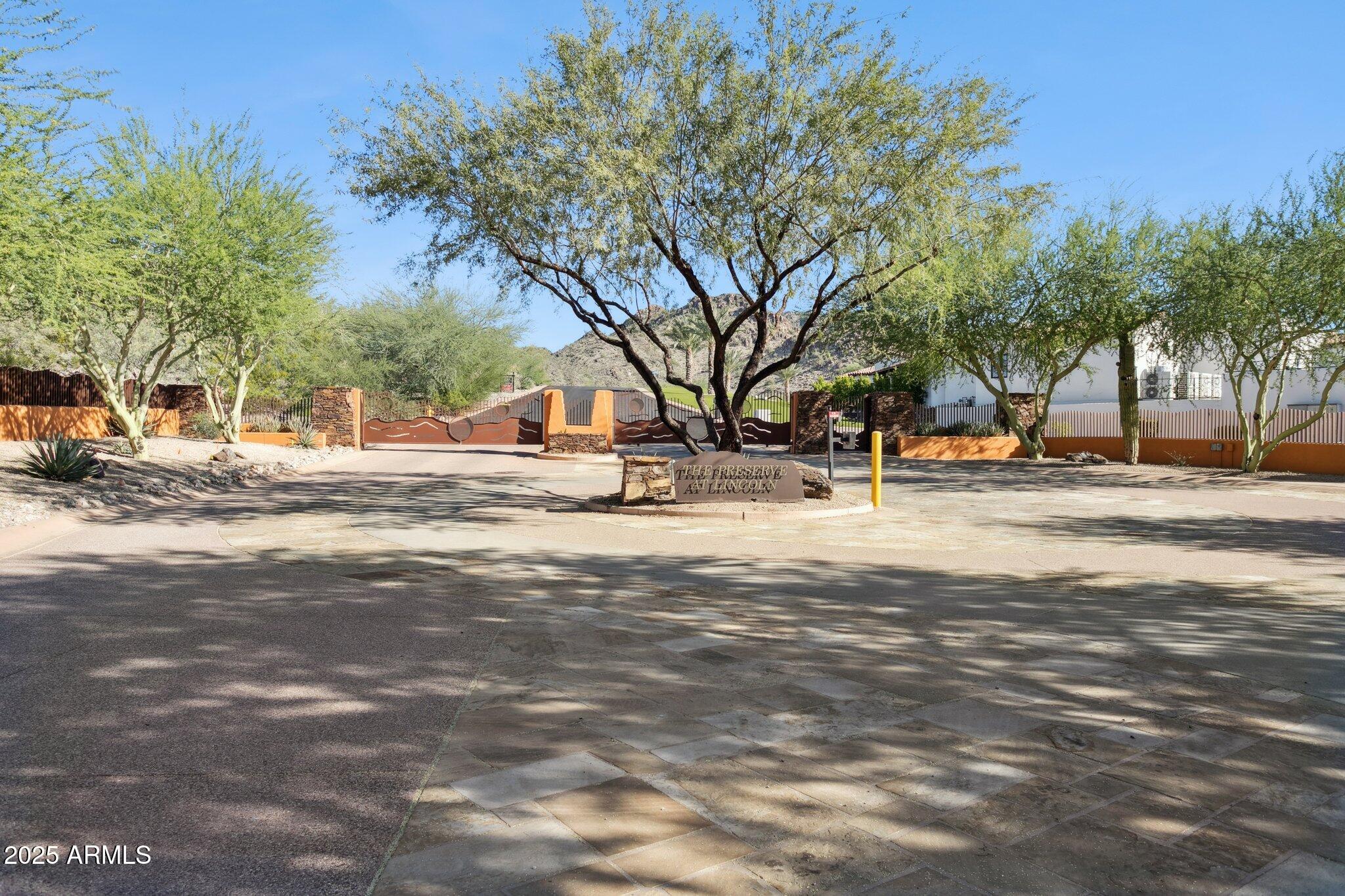 Tucked inside an exclusive gated enclave surrounded by multi-million-dollar estates, this prime one-acre lot offers endless potential. Ideal for a luxury home builder or buyer looking to create a private dream retreat, this lot is one of four available in the same subdivision—an exceptional opportunity for a developer or end user. Located just minutes from the Biltmore Fashion Park, top restaurants, hiking trails, and major freeways, this coveted Paradise Valley location delivers the perfect blend of  convenience and serenity. Very few lots left in Paradise Valley, let alone 4 in the same subdivision. Don't miss this opportunity!