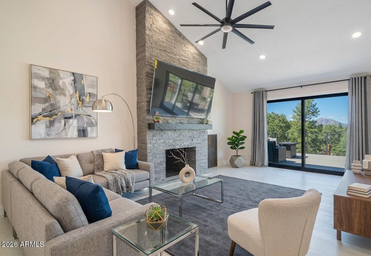A rare opportunity in the heart of Prescott: a fully rebuilt Mountain Modern residence designed as two complete homes under one roof. Reimagined from the foundation up by a licensed general contractor, this 1950s property now offers true dual-living flexibility--each level functioning as its own private residence with full kitchens, full laundry, and separate entrances. Whether you envision a multigenerational setup, a high-performing Airbnb, a mother-in-law retreat, or a luxury two-house compound, this property delivers unmatched versatility. Set in one of Prescott's most beloved walkable neighborhoods--just steps from the historic town square--this elevated retreat blends timeless charm with bold architectural sophistication. Surrounded by pines and framed by panoramic mountain views, the two-story, 5-bedroom, 4.5-bath home offers more than 1,500 sq. ft. of newly built living space seamlessly integrated into the original footprint. Dual-Residence Living (The Ultimate Flexibility) Two fully equipped kitchens and two full laundry rooms--ideal for multigenerational living, long-term guests, or income-producing rentals Lower level features its own private entrance, garage access, and a hidden flex room perfect for a theater, studio, gym, or creative space Thoughtfully designed to function as two independent homes or one expansive luxury residence Interior Highlights Gourmet commercial kitchen with GE Monogram appliances, 48'' built-in refrigerator, dual oven with skillet & wok, custom soft-close cabinetry, and a waterfall quartz island Vaulted ceilings, skylights, and dual-pane windows fill the home with natural light Three fireplaces--two electric and one wood-burning--add warmth and ambiance 16-ft sliding glass doors open to a stunning deck for seamless indoor/outdoor living Outdoor Oasis Two-story stone composite deck (24×14 ft) with sweeping mountain views Fully fenced backyard--private, pet-friendly, and perfect for entertaining New paver driveway, walkways, patios, landscaping, and drip system Comprehensive Rebuild Every major system and surface has been replaced, including: All-new electrical, plumbing, HVAC, roof, garage door, flooring, cabinetry, fixtures, and appliances Fully permitted and rebuilt by a licensed general contractor for long-term peace of mind Elevated Comfort & Style Spa-inspired bathrooms with oversized jacuzzi tubs and designer tile Refreshed staircase with new carpet, skylights, and windows Prime Walkable Location Located in the Historic Park District--one of Prescott's most sought-after neighborhoods--just a short stroll to restaurants, shops, parks, and trails. Lincoln Elementary, one of the area's top-rated schools, is also nearby. A One-of-a-Kind Dual-Home Retreat This property fuses historic charm, modern luxury, and true two-residence functionality--a rare combination in downtown Prescott. Whether you're seeking income potential, multigenerational living, or a luxury retreat with room to grow, opportunities like this simply don't come around twice. Schedule your private showing today.