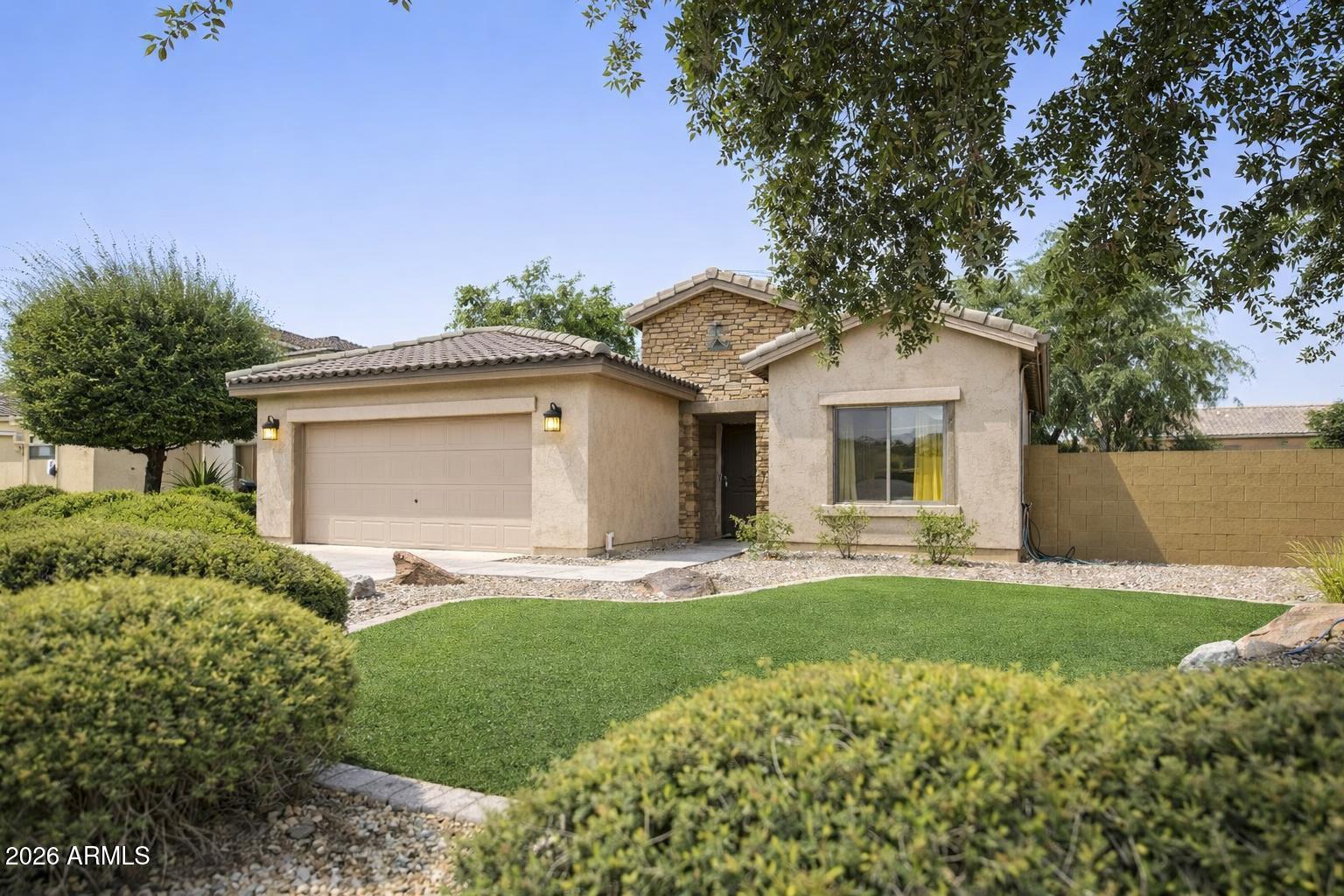 Move-in ready 4-bedroom, 2-bath single-level home in desirable Waddell featuring an open-concept floor plan and thoughtfully designed ADA-accessible enhancements. The spacious kitchen offers abundant cabinetry, generous counter space, a breakfast bar, and opens to the dining and living areas, making it perfect for everyday living and entertaining. The split primary suite includes a walk-in closet and private bath, while three additional bedrooms provide flexibility for guests, a home office, or hobbies. Enjoy a low-maintenance backyard and convenient access to Loop 303, parks, schools, shopping, dining, and outdoor recreation. A rare blend of accessibility, comfort, functionality, and location.