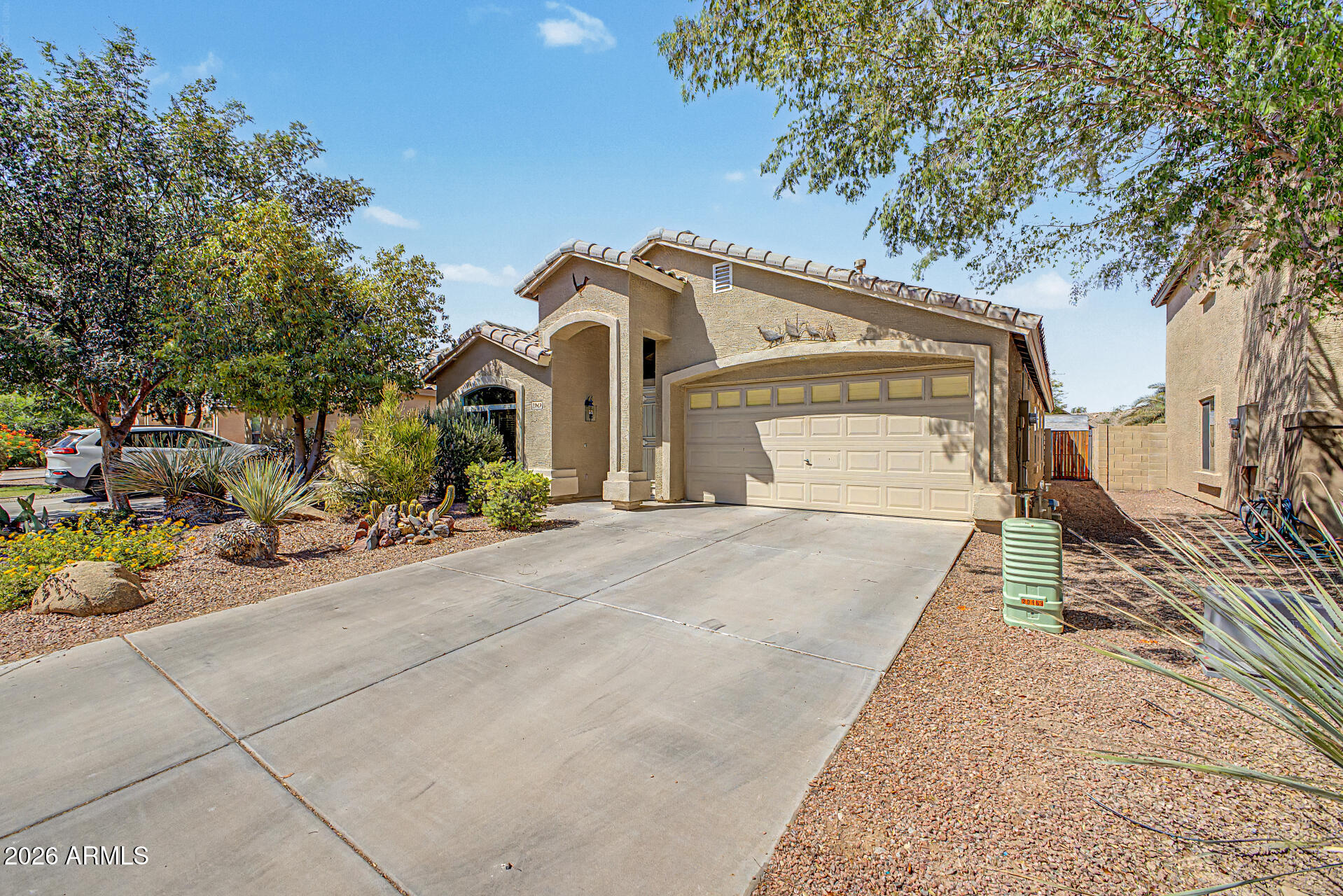 Beautifully Updated Single-Level Home in Desirable Johnson Ranch

Experience the perfect blend of comfort, efficiency, and low-maintenance living in the highly sought-after community of Johnson Ranch. This meticulously maintained 3-bedroom, 2-bathroom home offers an inviting open floor plan with soaring vaulted ceilings, abundant natural light, and ceiling fans throughout.

The well-appointed kitchen is designed for both functionality and style, featuring Corian countertops, reverse osmosis water filtration, LED lighting, a spacious walk-in pantry, and convenient pull-out shelving in select lower cabinets. The refrigerator is included, making this home truly move-in ready.

Step outside to a generously sized backyard designed for easy upkeep with attractive desert landscaping, a 6' x vinyl storage shed, and ample space to add a custom pool, outdoor entertaining area, or garden retreat.

Additional upgrades include an insulated garage and insulated garage door, epoxy-coated garage flooring, and a solar attic fan that helps improve energy efficiency and lower cooling costs throughout Arizona's warmer months.

Located within the award-winning Johnson Ranch master-planned community, residents enjoy access to exceptional amenities including three community pools, a public golf course, tennis and pickleball courts, parks, playgrounds, walking trails, and community events year-round.

Whether you're looking for a primary residence, seasonal getaway, or investment opportunity, this move-in-ready home offers outstanding value in one of the area's most amenity-rich communities. Don't miss your chance to make it yours!