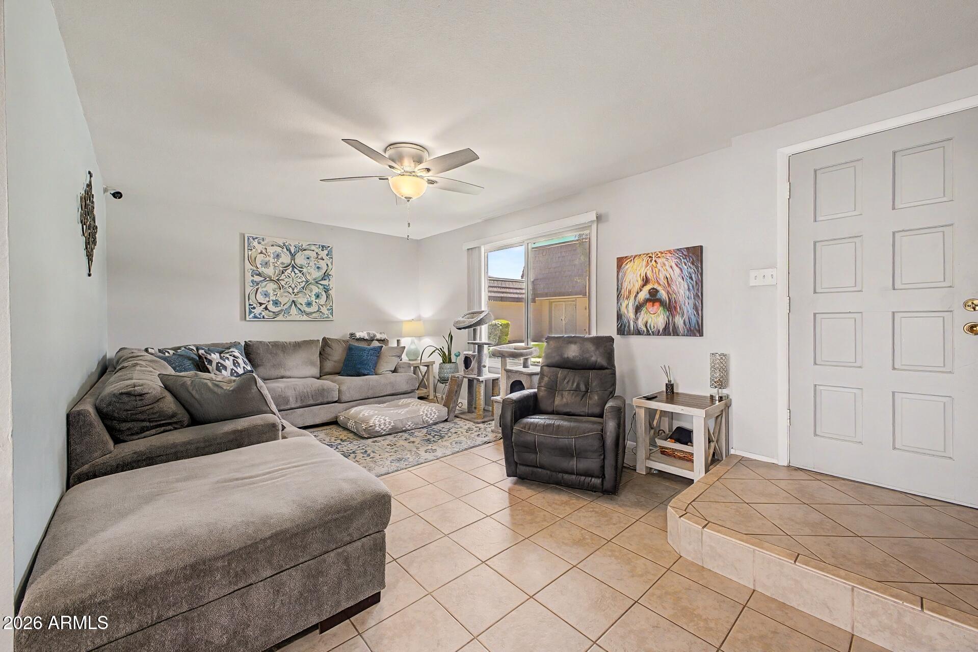 Beautifully updated townhome in the heart of Tempe! This move-in ready home offers spacious living areas, abundant natural light, and tasteful upgrades throughout. Upstairs you will find generously sized bedrooms, updated bathrooms, new windows and sliding glass door updated in 2022. Major recent improvements include a NEW ROOF in 2026 and NEW AC in 2024, offering added value and peace of mind. Enjoy the private patio space, covered parking, and low-maintenance living. Conveniently located near ASU, Tempe Marketplace, shopping, dining, parks, and easy access to the 101, 202, and US-60.