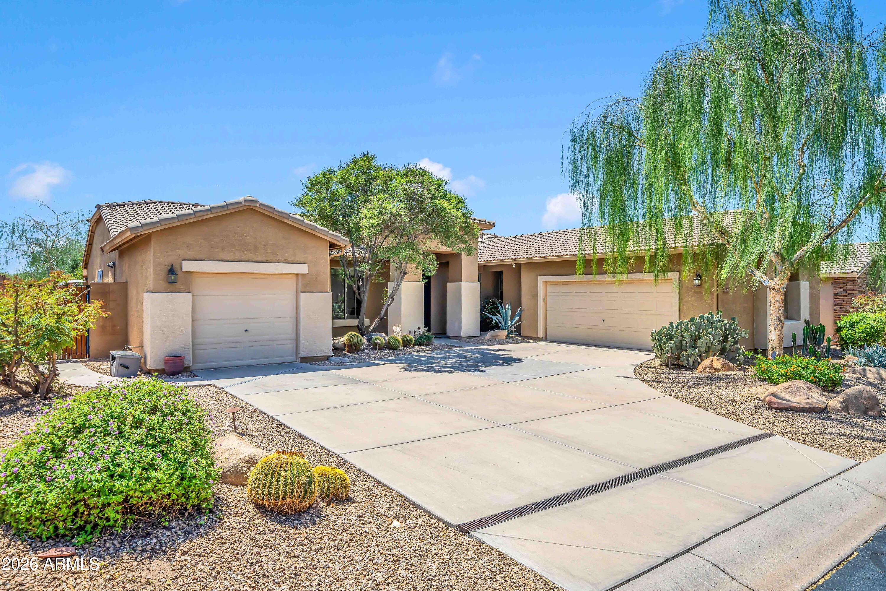 Where modern luxury meets everyday serenity, this beautifully renovated single level home in gated Terraza at Dove Valley Ranch blends style, comfort, and functionality. Featuring 5 bedrooms, 3 baths, a bonus flex room, and a private backyard oasis backing to a natural preserve, this home offers elevated indoor outdoor living in one of Cave Creek's most sought after communities. 
Enjoy easy access to top rated golf courses like Dove Valley Ranch Golf Club and Rancho Mañana Golf Club, as well as picturesque hiking trails at Spur Cross Ranch Conservation Area and Cave Creek Regional Park. Step inside to soaring 9+ ft ceilings, abundant natural light, fresh paint, updated wood style plank tile flooring, and new carpet, creating a bright and inviting feel. The formal living room flows into a gourmet kitchen with refinished 42" white cabinetry, pull outs, a large waterfall quartz island, quartz backsplash, double ovens, and a custom pantry with a built in coffee station. The open layout connects seamlessly to the family room and covered patio, ideal for everyday living and entertaining.
A thoughtfully designed split floor plan enhances privacy and livability. The primary suite serves as a peaceful retreat with serene views, marble flooring, dual quartz vanities, a soaking tub, separate shower, and a custom walk in closet. Secondary bedrooms are well positioned for comfort and flexibility, ideal for guests, family, or a home office.
Enjoy a backyard oasis featuring a pebble pool with removable fence option, waterfall, outdoor shower, turf, citrus trees, and a covered patio, all backing to a natural preserve for added privacy and tranquility.
Perfectly located near top rated Cave Creek Unified schools and trusted care at Abrazo Cave Creek Hospital and HonorHealth. Don't miss your chance to call this sought after gated community home.