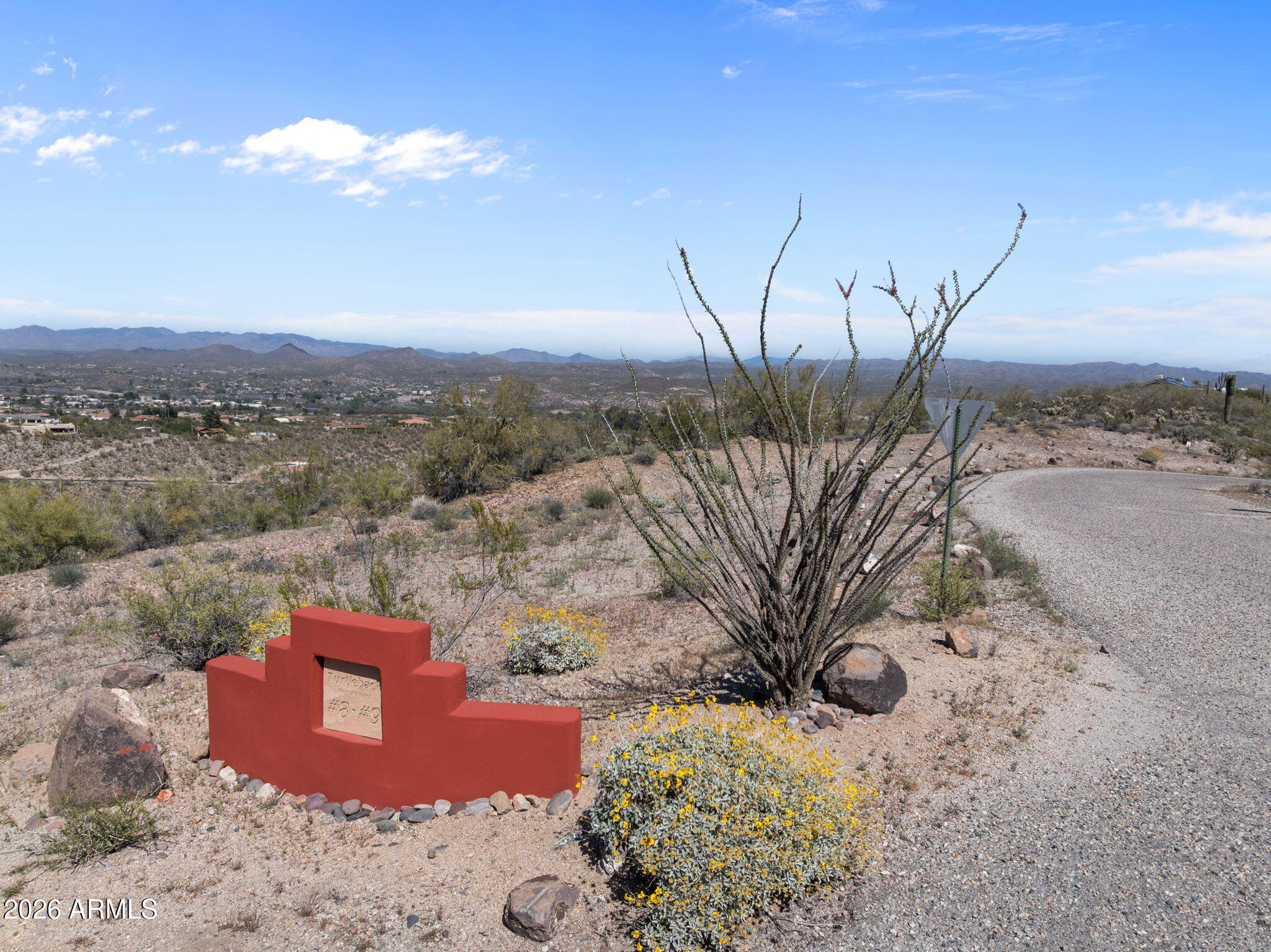 Discover an incredible opportunity to own 5 pristine acres in the highly sought-after Turtleback Mountain Ranch in beautiful Wickenburg. This exceptional home site offers breathtaking panoramic views of the surrounding mountains and the charming town of Wickenburg, providing the perfect backdrop for your future dream home. The property is build-ready with valuable infrastructure already in place. Underground electricity has been run directly to the lot, and a shared well is already established, significantly reducing development costs. The seller has also completed site plans, giving buyers a head start in the building process. A perc test was previously performed indicating the property can accommodate a septic system, adding further peace of mind for future construction. Accessibility is excellent with two paved roads providing direct access to the property, making it convenient while still offering the privacy and tranquility of Arizona's high desert landscape. Homes in this community are beautiful and show craftmanship. Enjoy the best of both worlds with close proximity to local restaurants, shopping, and Wickenburg's renowned roping arenas, while still feeling tucked away in a peaceful mountain setting. With stunning views, essential utilities in place, and build plans already started, this property is a rare opportunity to create your custom desert retreat in one of Wickenburg's most desirable areas. Bring your vision and start building your dream home today!