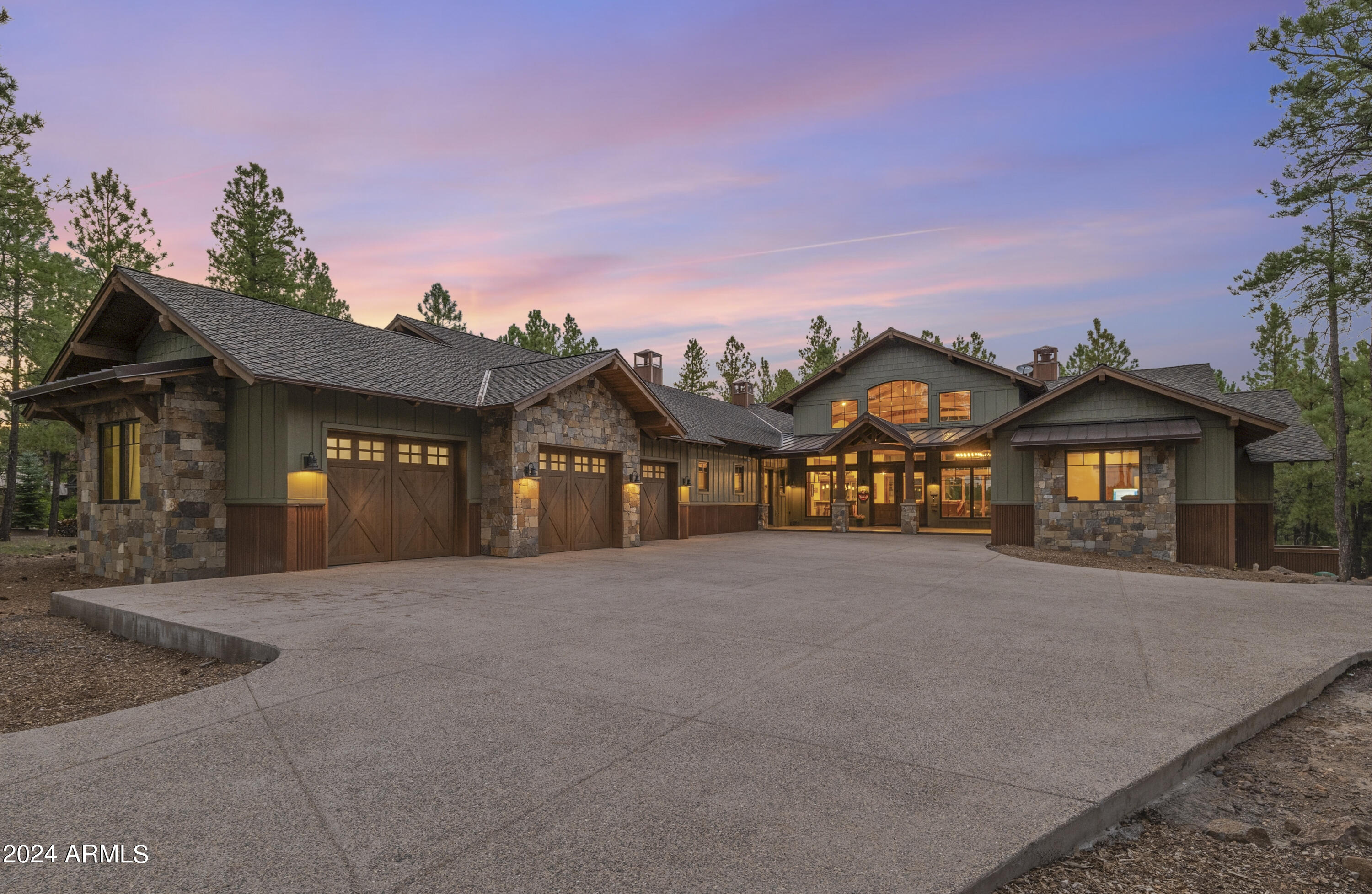 Introducing 2932 Andrew Douglass located in the private, gated, luxury golf community of Forest Highlands in Flagstaff, Arizona. Spectacular, newly completed home with breathtaking golf course and San Francisco Peak views.  This newly completed masterpiece offers a harmonious blend of luxury and modern comfort. Officially completed with a Certificate of Occupancy in June 2024, this stunning residence is perched high above the 15th hole of the Meadow Golf course on over an acre of pristine land. Step in and be immediately captivated by the open floor plan, soaring cathedral ceilings, gorgeous, reclaimed hardwood floors and Telluride Stone fireplace. The expansive living areas seamlessly connect with the outdoors through an impressive 20-foot-wide opening with pocket doors, which open to both covered and uncovered decks, complete with fireplace, fire pit and a host of other jaw-dropping amenities.  The interior full bar has accordion-style windows that completely expose it to the outdoor space as well.  Prepare to be amazed at the chef's dream kitchen, equipped with Wolf, Sub-Zero, and Cove appliances, including 4 ovens, (one is convection/steam), built-in vacuum sealer, warming drawer, multiple Sub-Zero refrigerators and freezers, and two Cove dishwashers.  And... there is a walk-through butler's pantry with a brick barrel ceiling that will knock your socks off!  The residence boasts multiple bedrooms, each with its own en-suite bath and walk-in closets, and a morning bar ensuring comfort and privacy for all.  Oh yes, there's an additional family room that provides extra space for relaxation or play.  This home is designed with efficiency and comfort in mind, featuring fully foamed insulation throughout the entire ground surface in the crawlspace (with an HRV - heat recovery ventilation system), walls, and attic areas, ensuring year-round efficiency.  Top it off with an oversized 3 car garage and Central A/C.  Wait until you see the laundry room/craft room, plumbed for a dog wash and expansive below-deck dog play area! This is a rare opportunity to own one of the most amazing properties in Northern Arizona with every amenity you could desire and experience the perfect blend of elegance, functionality, and breathtaking natural beauty.

Tucked away amidst 1,100 acres of pristine alpine beauty, Forest Highlands exudes an unparalleled sense of exclusivity and serenity. With two championship golf courses designed by Tom Weiskopf and Jay Morrish, Forest Highlands sets the stage for unforgettable golf experiences. The community offers an array of exceptional amenities, including two clubhouses, multiple dining options, tennis courts, swimming pools, and miles of hiking and biking trails. Forest Highlands is a retreat where luxury meets nature, ensuring a harmonious lifestyle for its residents.

Owners are licensed real estate agents/brokers in the state of Arizona.