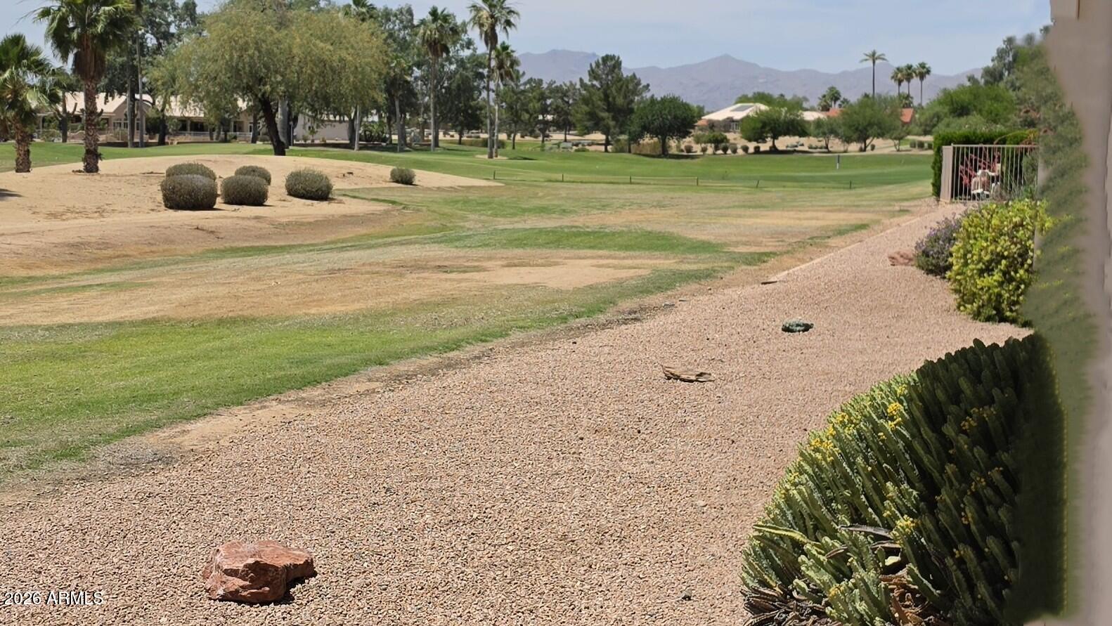 Premium Golf course lot located on 2nd T-box of Desert Trails Course*Panoramic views overlooking the beautiful course with Mtn. views* Huge Kitchen w/island, pull outs, pantry, induction cooktop, plus the owner has left cookware for the upgraded cooktop, built in oven/microwave, includes a French door refrigerator, all SS appliances new in 2025* Included upgraded front load washer/dryer*Relax in you luxurious spa like primary bath w/soaking tub and separate shower* private toilet room*large primary closet*2nd bedroom suite w/private bathroom*3rd bedroom split w/bathroom in the same area*No Carpet! Waterproof Luxury vinyl flooring throughout*3 1/2 car Garage w/epoxy flooring & storage cabinet*roof 2025* 50 AMP outlet for RV's* Beautiful10 ft ceilings*Both AC's less than 15 years old ! Sun City West is the place to be!  Enjoy 7golf courses, pickleball,  4 pools, baseball, bowling, Billiards,  library, theatre, goofy golf, Bocce ball, Walking and biking trails, Dog Park, just to name a few. Literally 100's of chartered clubs and activities, year round enjoyment,  there is something for everyone! Near Shopping and dining.