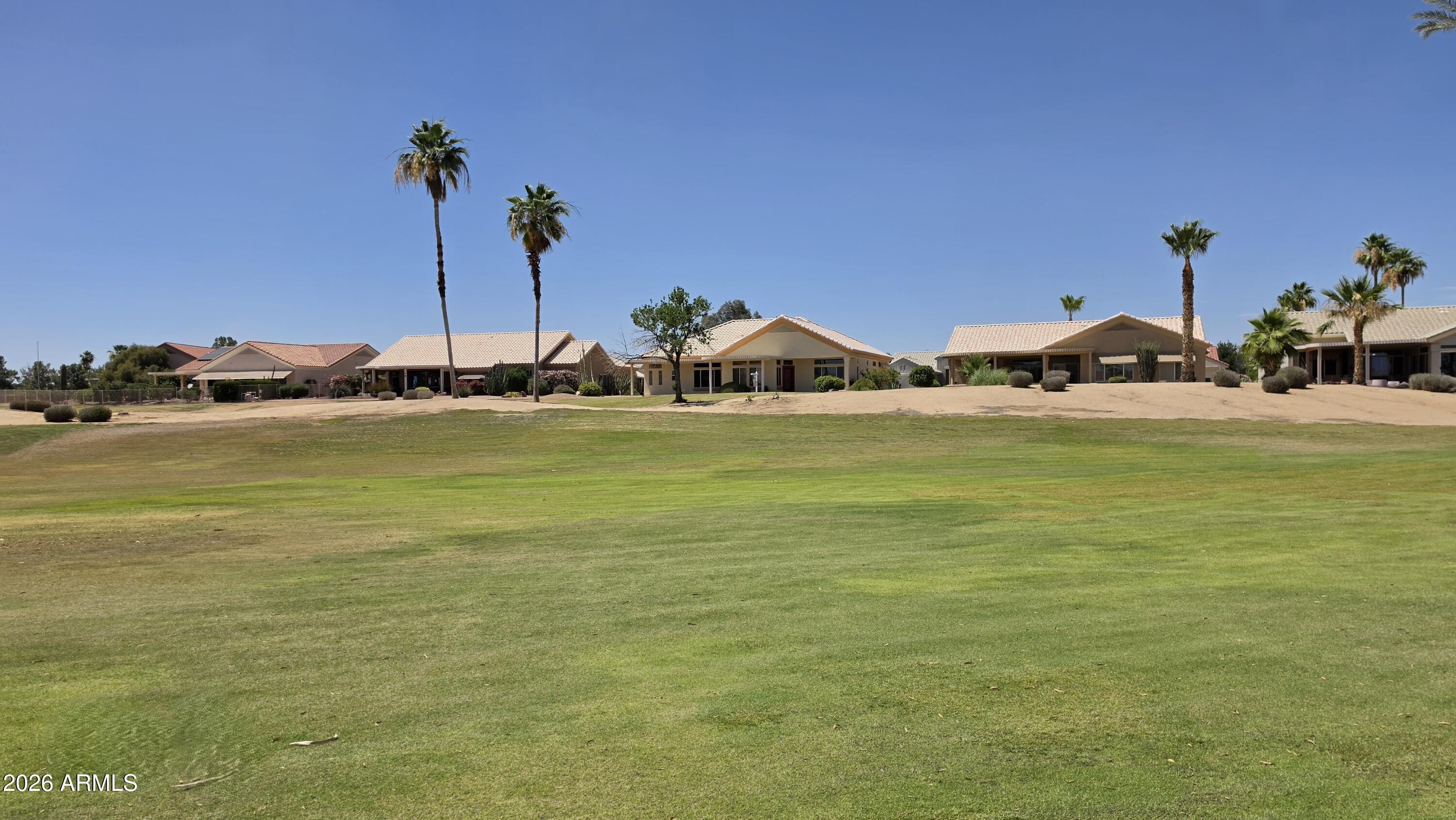 Premium Golf course lot located on 2nd T-box of Desert Trails Course*Panoramic views overlooking the beautiful course with Mtn. views* Huge Kitchen w/island, pull outs, pantry, induction cooktop, plus the owner has left cookware for the upgraded cooktop, built in oven/microwave, includes a French door refrigerator, all SS appliances new in 2025* Included upgraded front load washer/dryer*Relax in you luxurious spa like primary bath w/soaking tub and separate shower* private toilet room*large primary closet*2nd bedroom suite w/private bathroom*3rd bedroom split w/bathroom in the same area*No Carpet! Waterproof Luxury vinyl flooring throughout*3 1/2 car Garage w/epoxy flooring & storage cabinet*roof 2025* 50 AMP outlet for RV's* Beautiful10 ft ceilings*Both AC's less than 15 years old ! Sun City West is the place to be!  Enjoy 7golf courses, pickleball,  4 pools, baseball, bowling, Billiards,  library, theatre, goofy golf, Bocce ball, Walking and biking trails, Dog Park, just to name a few. Literally 100's of chartered clubs and activities, year round enjoyment,  there is something for everyone! Near Shopping and dining.
