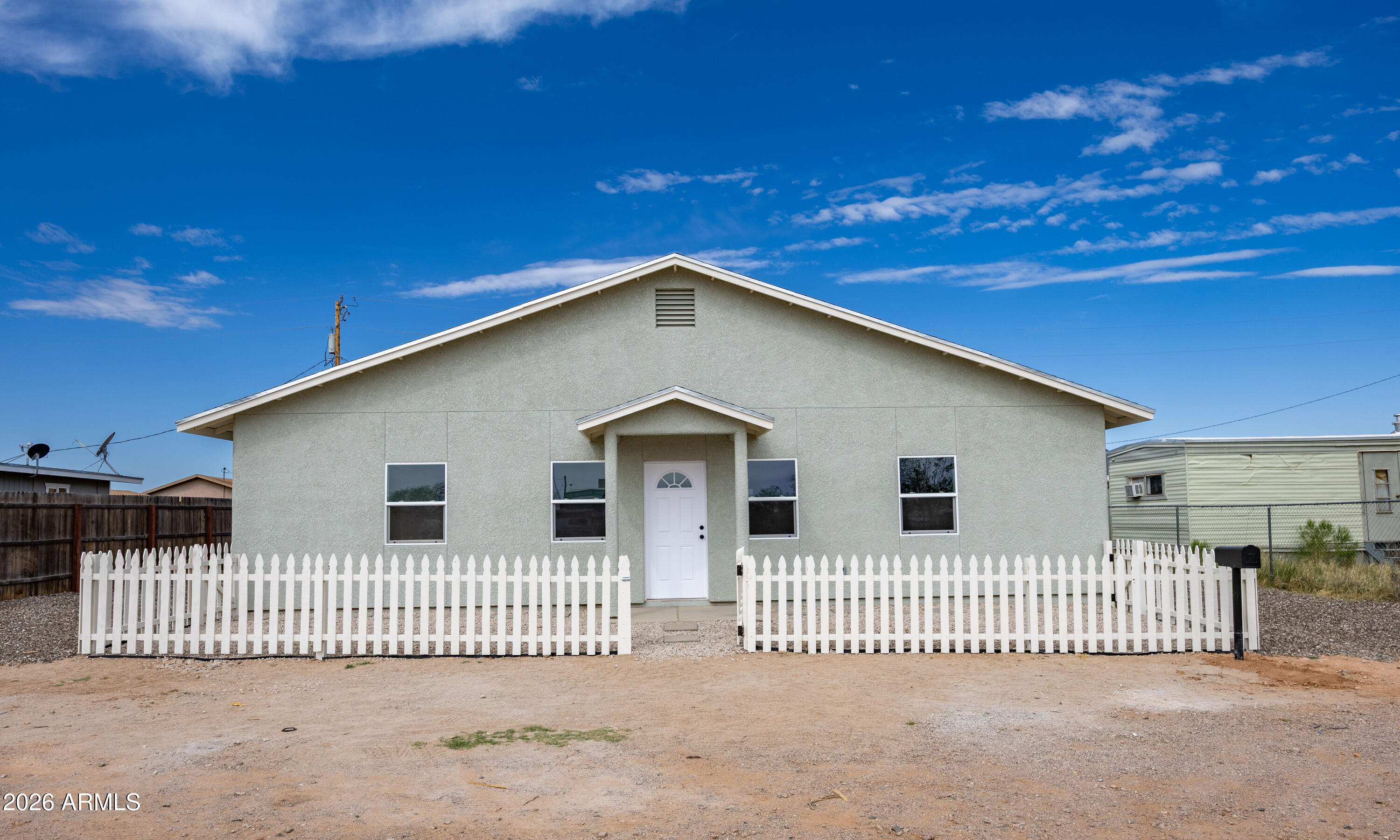 Step into modern 3 bedroom 2 bath new build home featuring a sleek gourmet kitchen with quarts countertops and stainless steel appliances, featuring a light filled living room, spacious fenced backyard.