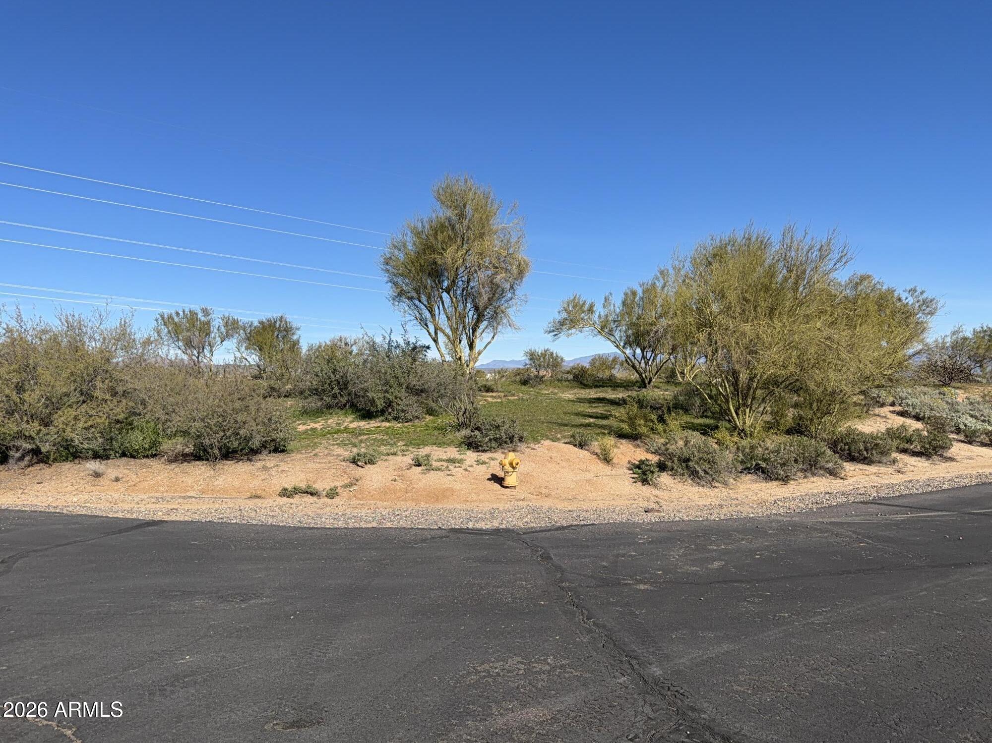 Beautiful peaceful lot - Over 2 acres in Upscale Gated Equestrian Neighborhood. Subdivision boasts community arena and wash stalls for horses. 
North South Exposure as well. Panoramic Mountain and Desert views. Close to town just an 11 min drive to Pima rd and easy access to freeways, world class shopping and dining and lots of entertainment resides. Close to Bartlett lake up North and near several other lakes. Avail for sale as a package with Morgan Taylor homes listing # 6954267 with a discounted lot price with the home. 2026 is Year of Elevating Life, this lot can provide that.