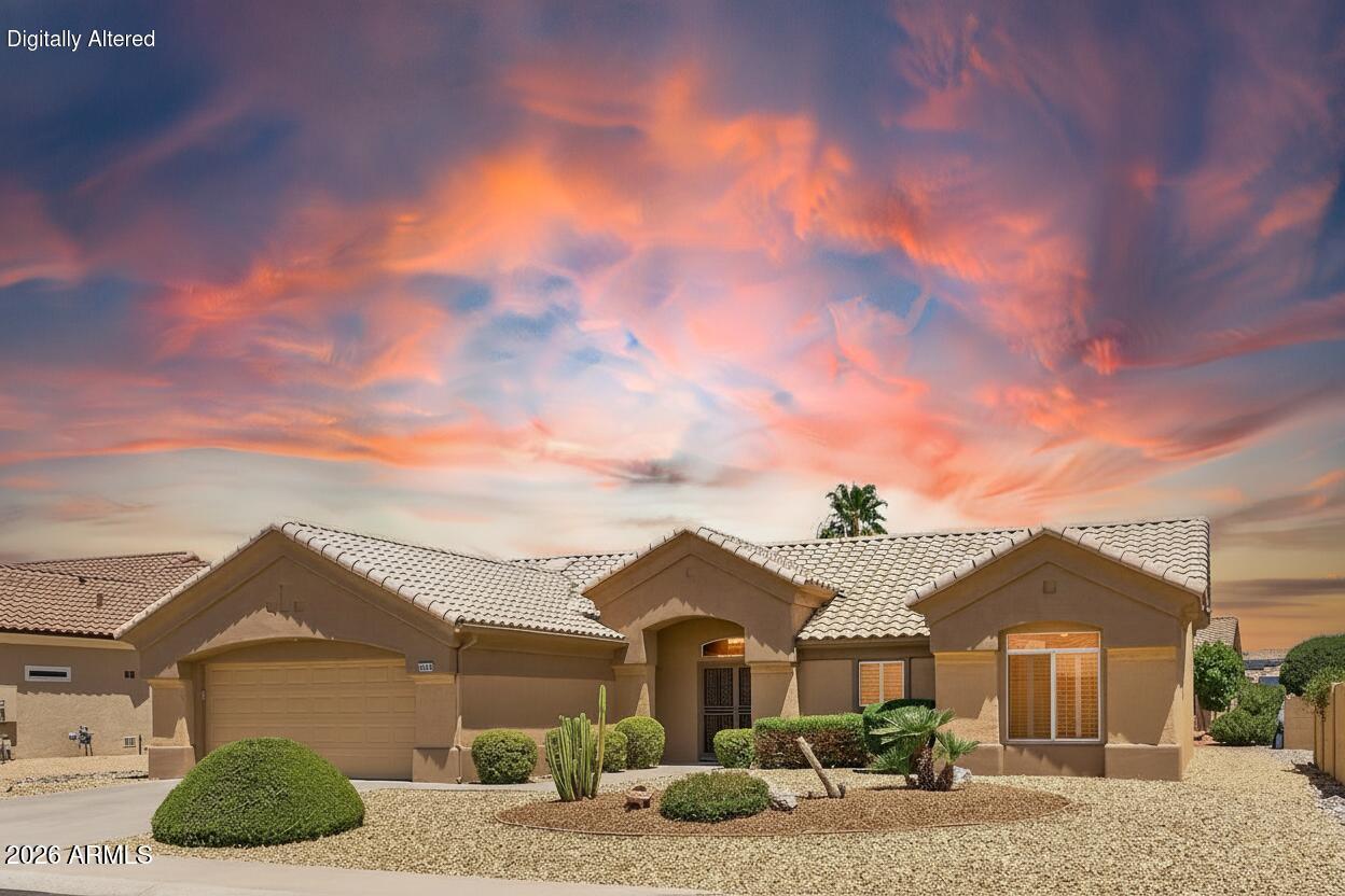 This well-maintained WINSLOW model combines an outstanding Sun City West location with updates and pride of ownership throughout. Situated on sought-after Sentinel Drive with no HOA fees & low property taxes, this home offers the opportunity to enjoy the Sun City West lifestyle while benefiting from numerous major improvements already completed.

The kitchen has been updated with refreshed cabinetry and countertops, a stone composite sink, updated fixtures, and quality stainless steel appliances, including a 2023 KitchenAid French-door refrigerator and LG appliance suite with a 5-burner gas range (2018). Recent improvements include roof underlayment  replaced in 2019, HVAC system in 2017, gas water heater in 2018, irrigation system in 2018, exterior paint in 2021, and a newer garage door and opener. These investments help reduce future maintenance concerns and add long-term value.

Inside, warm neutral finishes, plantation shutters, and honeycomb shades create a comfortable and energy-efficient environment. The primary suite features dual vanities, a spacious walk-in closet, and mirrored wardrobe doors. The indoor laundry room includes a utility sink, abundant storage, and the washer and dryer convey with the home.

The oversized garage accommodates two vehicles plus tandem golf cart parking or additional storage space. The north-facing backyard offers a covered patio and mature desert landscaping with underground PVC dirp irrigation designed for low-maintenance enjoyment.

For buyers seeking a move-in-ready home with key system updates already completed, an excellent location, and no HOA fees, this Sentinel Drive property deserves a closer look.