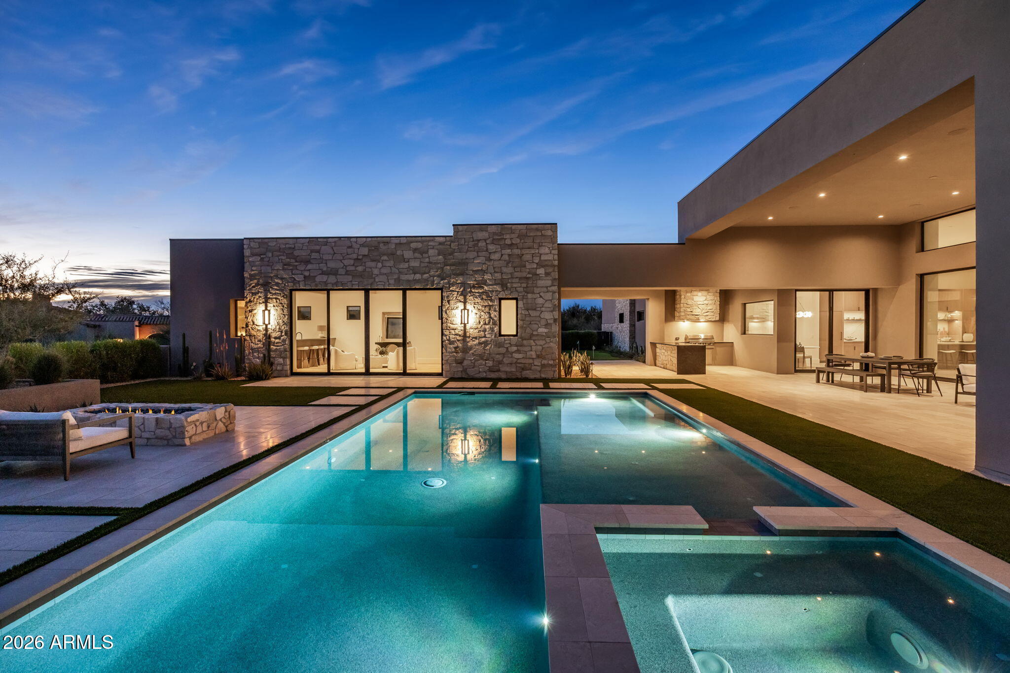 Discover the best-priced new build in the prestigious Whisper Rock Estate, offering an exceptional blend of privacy, luxury, and modern design. This 4-bed, 6.5-bath new construction sits on over an acre, offering ultimate privacy and luxury. The open-concept courtyard leads to a separate guest/mother-in-law suite with its own entrance. A chef's dream kitchen features Sub-Zero Wolf appliances, a walk-in pantry, and a wine cellar. Enjoy a media/playroom, a 3-car garage with a Tesla charger, and a pool house perfect for summer days. Don't miss this exceptional opportunity! The HOA will allow the Hopseed bushes to grow to its natural height for additional privacy (8ft-10ft tall).