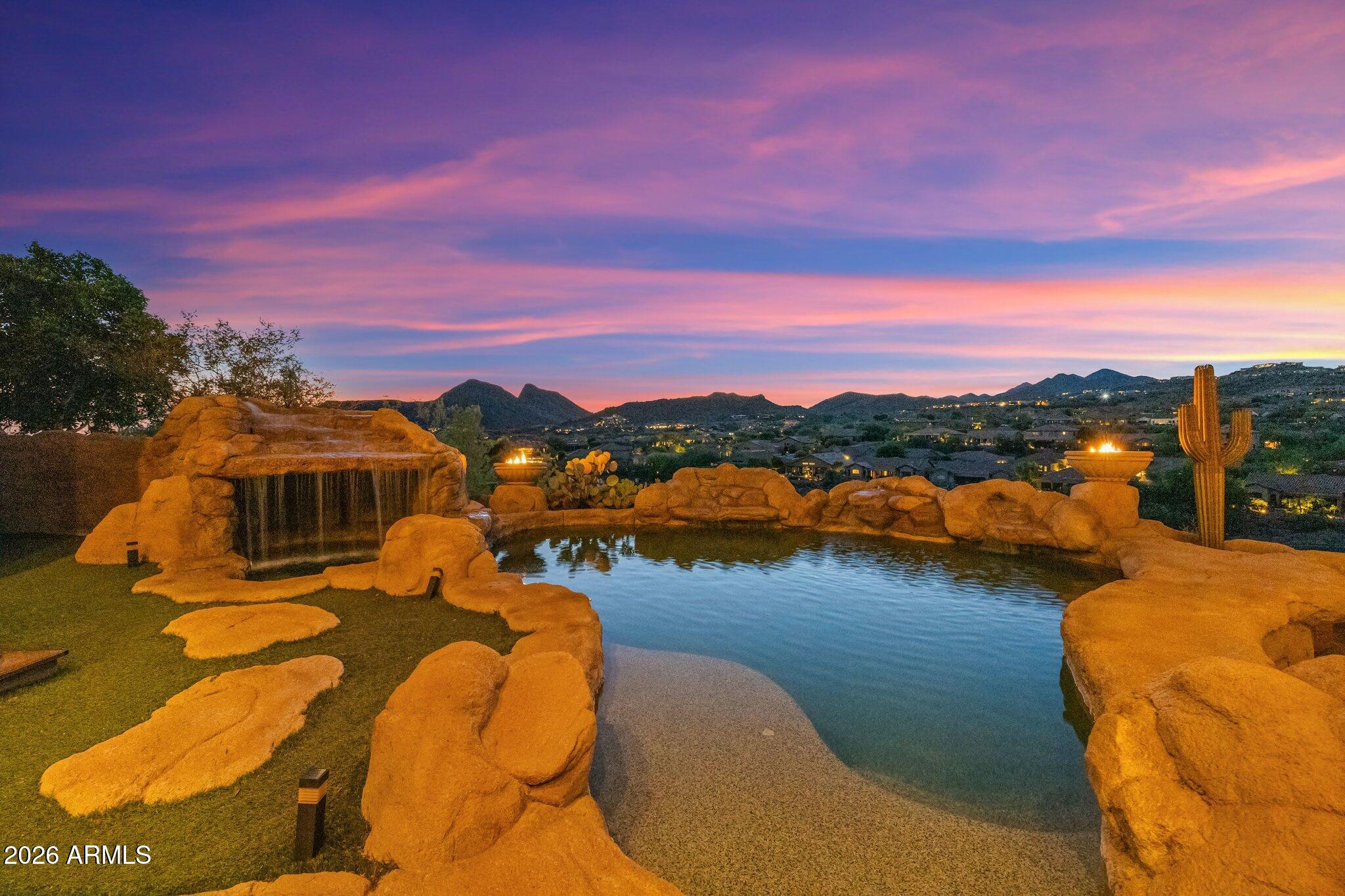 Perfectly positioned along the 2nd fairway of Eagle Mountain Golf Club, this exceptional residence captures sweeping golf course, mountain, and city light views from one of Fountain Hills' most sought-after settings.

Designed for both everyday living and unforgettable entertaining, the home offers an expansive floor plan with seamless indoor-outdoor flow and multiple gathering spaces. The walkout lower level opens to a resort-style backyard where guests can enjoy the sparkling pool and spa, generous patio areas, and breathtaking desert vistas.

The north-facing backyard provides year-round enjoyment, while the elevated setting showcases stunning views in every direction. Whether hosting a sunset dinner party, watching the city lights come alive, or enjoying a quiet morning overlooking the 2nd fairway, this home delivers a lifestyle that is distinctly Arizona.

Located within the gated Eagle Mountain community, this property combines privacy, scenic beauty, and premier golf course living just minutes from Fountain Hills amenities, dining, shopping, hiking trails, Scottsdale, and the Mayo Clinic.

A rare opportunity to own a luxury golf course home with exceptional views, a walkout design, and the ultimate entertainer's setting.