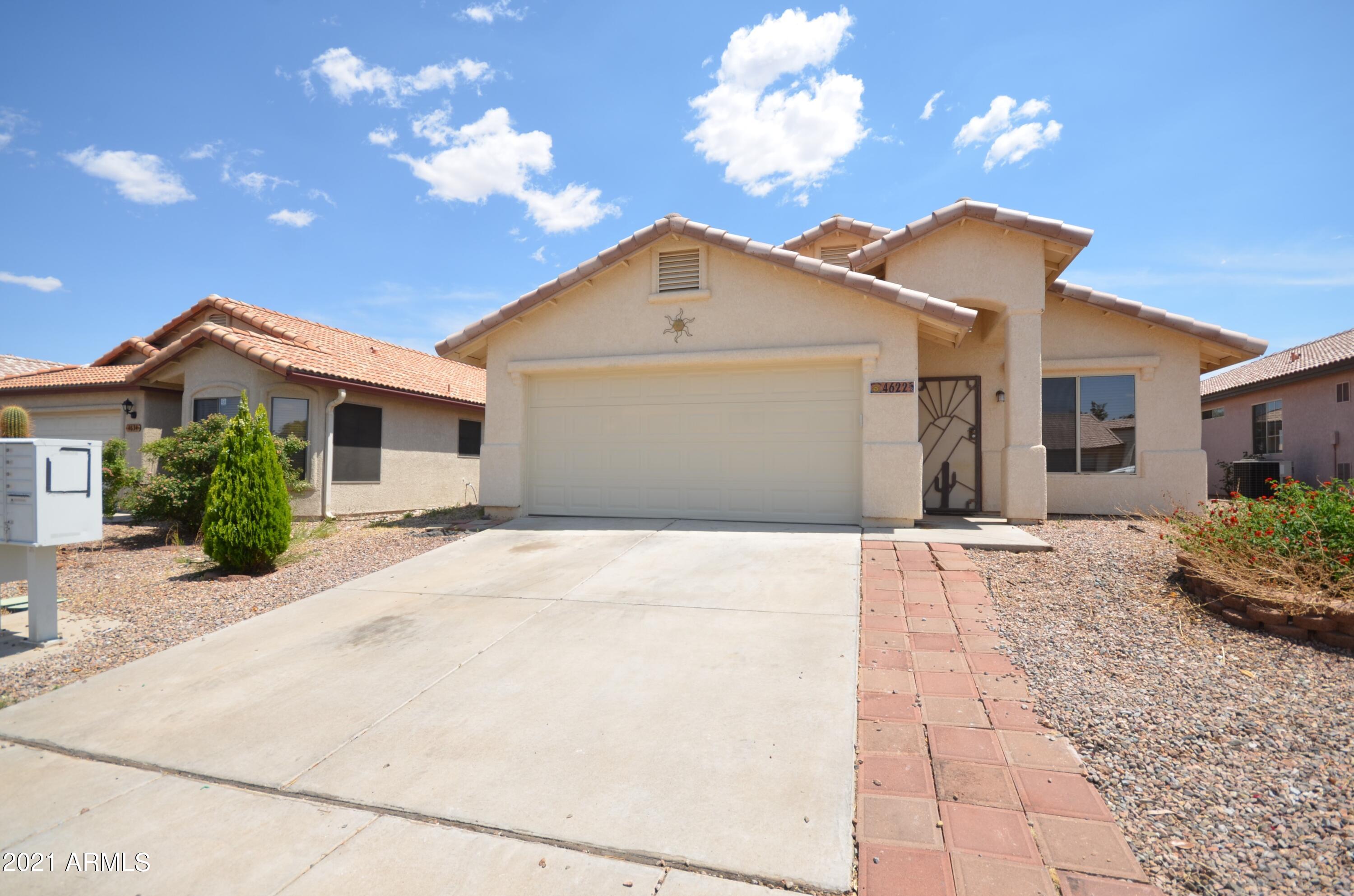 You'll love this adorable 1449sqft 3 bed, 2 bath home with 2 car garage! The vaulted ceilings give a very spacious feeling when you step inside. The open kitchen has a large amount of counter space, a breakfast nook and a pantry closet. The large master bedroom and bathroom have a walk in closet, garden tub and separate shower with access to the patio from the master bedroom. The backyard is larger than most and has NO BACKYARD NEIGHBORS! Move in ready and waiting for YOU! Call TODAY! It won't last long!