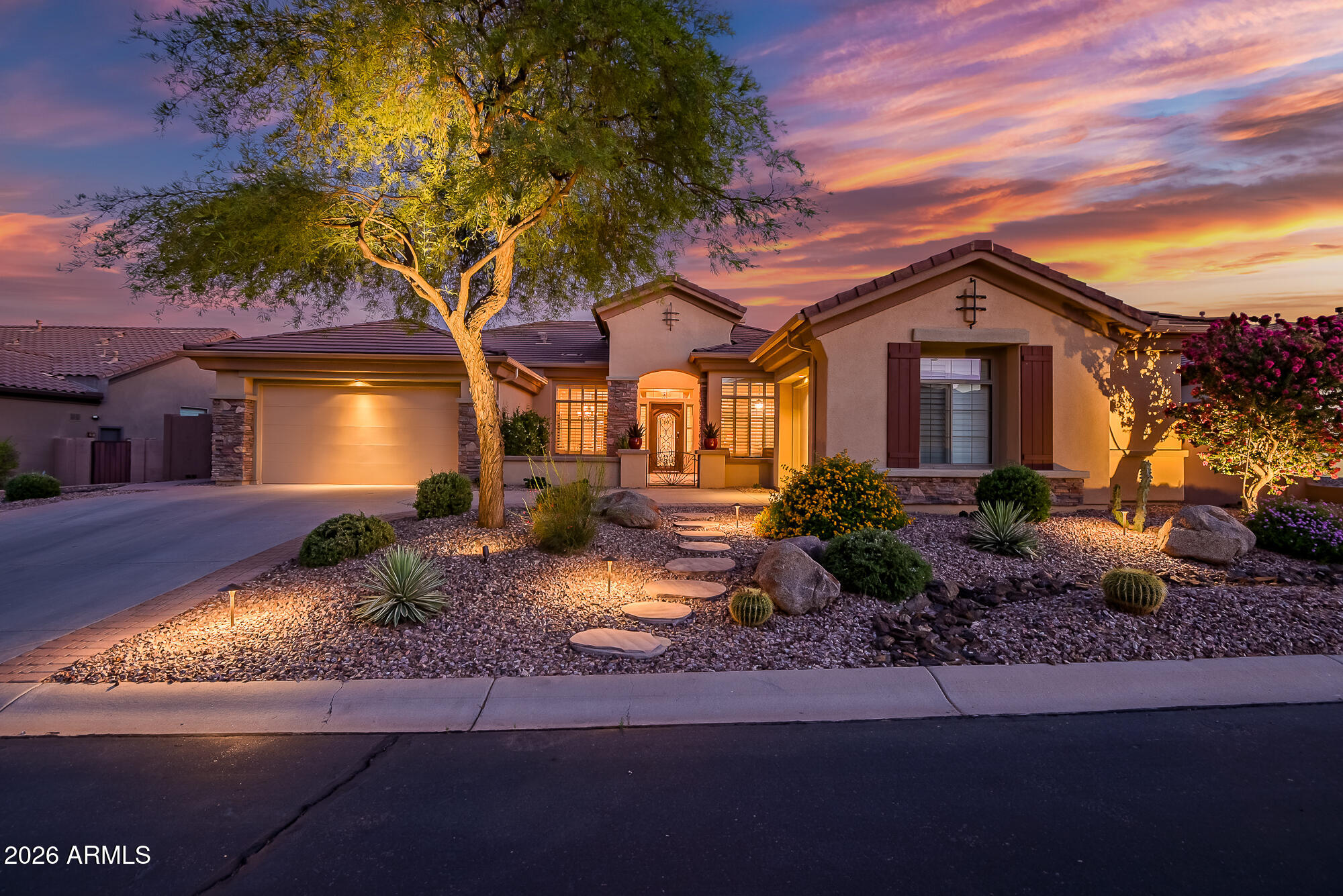 Stunning Anthem Country Club home at 1319 W Wayne Court, Anthem, AZ 85086. This completely updated Sonoma floor plan offers timeless elegance and thoughtful modern touches in Arizona's premier 36-hole guard-gated golf community. A welcoming paver courtyard invites you to step through the scrolled iron-and-glass door. Inside you will find no interior steps, Porcelain plank flooring flowing throughout, complemented by stacked stone accents on the custom fireplace, wine cellar, and master bath. Granite slabs top the kitchen, butler pantry, laundry room countertops, and suede finished granite bathroom countertops. Plantation shutters, newer infinity windows, and sliding glass doors frame the views while filling the spaces with natural light. Open concept from the family room to the gourmet kitchen that includes an eat-in dining area, breakfast bar, newer appliances, and gas cooktop. 

The master bath is a relaxing retreat featuring a soaking tub, dual rain-head shower with handheld wand, while two bedrooms offer ensuite baths with stylish barn-door glass-panel showers. The master also includes a Huge built-in closet with ample drawers, shelving and storage space. Outside, the fully landscaped backyard creates the perfect setting for gatherings with a sparkling pool, water features, travertine deck, large lighted ramada with built-in BBQ grill, crushed-glass fire pit and cauldrons. Manual sun shades provide easy shade and privacy across the patio. Upgrades include New decorative lighting and irrigation system in the front and back, Trane 4-ton dual AC condensers and furnaces installed in 2021 with four Wi-Fi programmable thermostats for year-round comfort, plus OWNED solar panels installed in 2020 that deliver zero-dollar monthly APS bills. The epoxy-coated garage floor and premium cul-de-sac location complete this low-maintenance, high-quality home.

An exceptional find in a fantastic community, this residence is ideal for those who appreciate championship golf, resort-style amenities and effortless Arizona living.