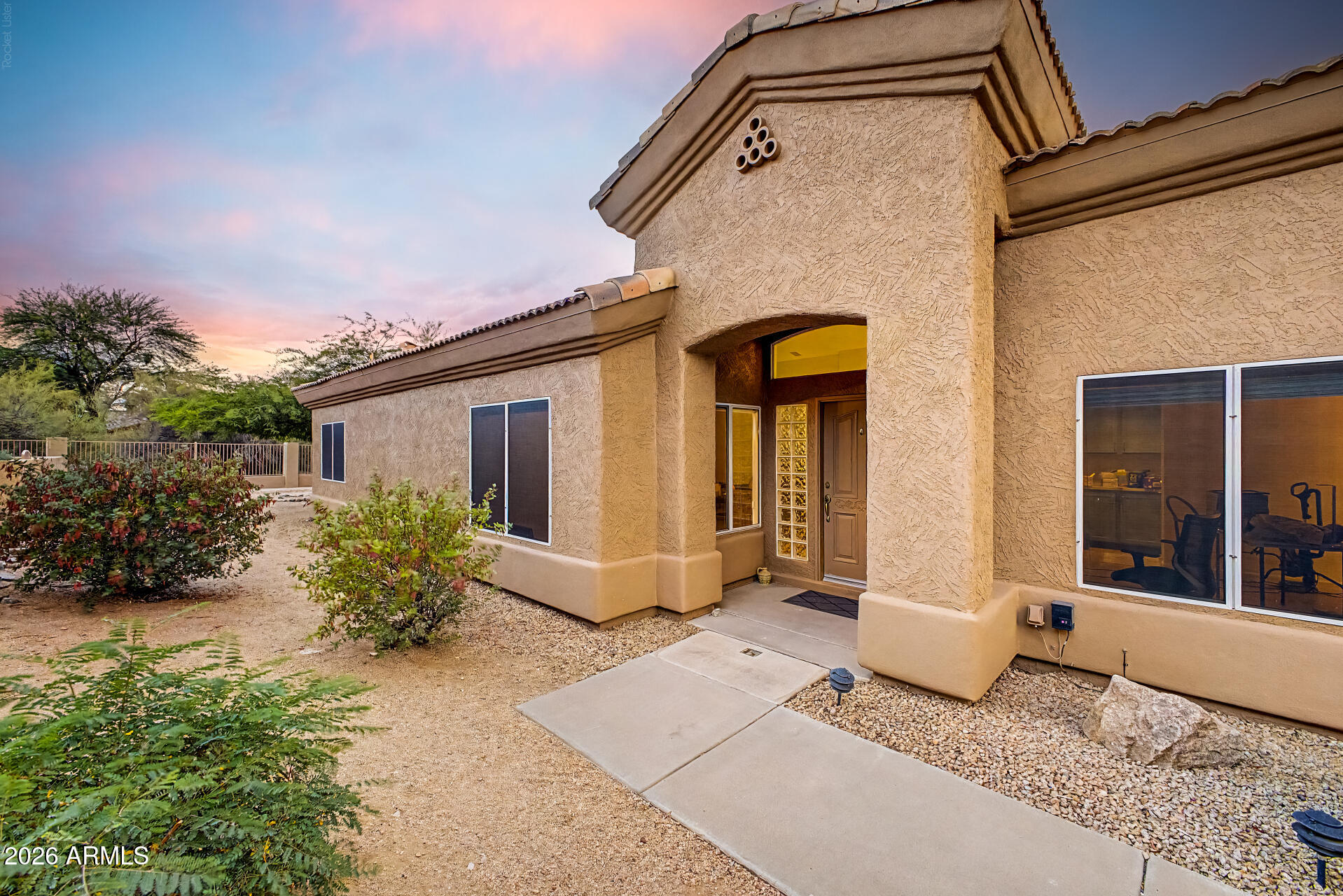 Welcome to gated Tatum Village, a highly sought-after patio home community within Tatum Ranch. This beautifully updated home offers the perfect blend of comfort, convenience, and low-maintenance living. Inside, soaring ceilings, abundant natural light, and premium luxury vinyl flooring create a warm and inviting atmosphere. The updated kitchen features quartz countertops, newer stainless steel appliances, updated sink and faucet, and opens seamlessly to the spacious living and dining areas, making everyday living and entertaining effortless. A versatile den provides the perfect space for a home office, hobby room, or guest retreat. Residents enjoy an exceptional lifestyle with resort-style amenities, including a sparkling pool and spa, tennis courts, lush greenbelts, and more. Ideally situated near Tatum Ranch Golf Club, premier shopping, dining, and Desert Ridge Marketplace, this home offers the perfect balance of tranquility and accessibility. A rare opportunity to own in one of the area's most desirable communities.

Step outside to a covered patio overlooking beautifully maintained common areas, providing a peaceful setting to relax and unwind. Residents enjoy an exceptional lifestyle with resort-style amenities including a sparkling pool and spa, tennis courts, lush greenbelts, and walking paths. Ideally located near Tatum Ranch Golf Club, Desert Ridge Marketplace, shopping, dining, hiking trails, and major commuter routes, this home offers the perfect balance of tranquility and convenience. A rare opportunity to own in one of North Phoenix's most desirable communities.