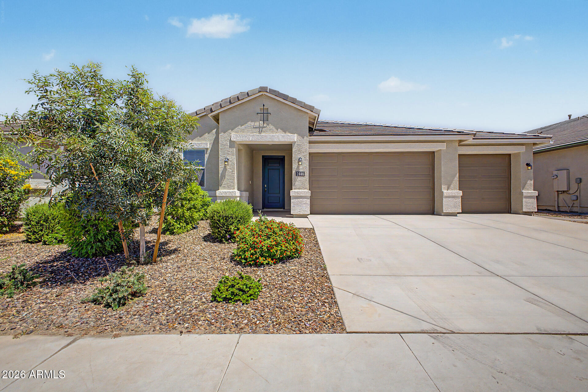 Welcome to Radiance at Superstition Vistas. This single level 4 bedroom, 3 bathroom home offers mountain views, a 3 car garage, an open great room, quartz countertops, stainless steel appliances, and a spacious kitchen island. The backyard is already finished with a covered patio, extended pavers, and artificial turf, making it ready to enjoy from day one. Community amenities include a pool, clubhouse, workout facility, walking paths, and playgrounds. Qualified buyers may also benefit from an assumable FHA loan at 3.99 percent until November, then 4.99 percent. Move in ready, upgraded, and easy to love. 

Photos may include virtual staging for illustrative purposes only.