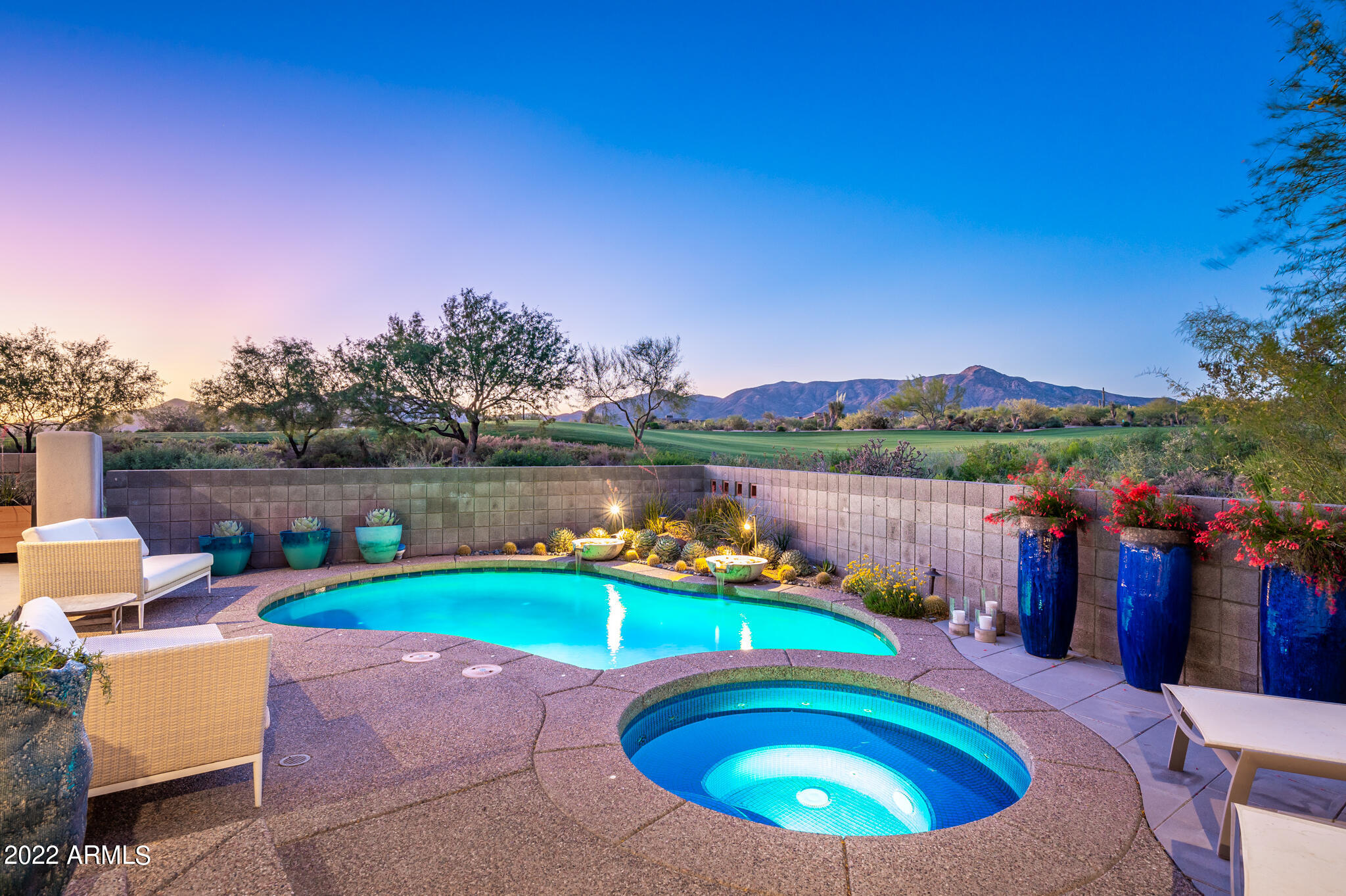 Amazing remodel of spacious Larkspur floor plan with guest house. When you open the all-glass front door you are captivated by the 6th fairway of Apache golf course offering mountain vistas beyond. Bing Hu architecture with tongue & groove ceilings encompasses the open living, dining, and family rooms with live-edge wet bar centrally located for great entertaining with No Steps. Remodeled with designer finishes, chefs kitchen with expanded island, new appliance, and custom cabinetry, wood floors throughout & high-end lighting, state-of-art whole-house Crestron system. Outdoor living features multiple covered patios, refinished pool, spa, fire-pit, and new built-in BBQ. This home is truly a gem for your most discriminating buyer. Sold Turnkey under Separate Bill of Sale. Seller is willing to forfeit their Desert Mountain Club membership to Buyer.  Buyer should contact Desert Mountain Membership staff for process details.