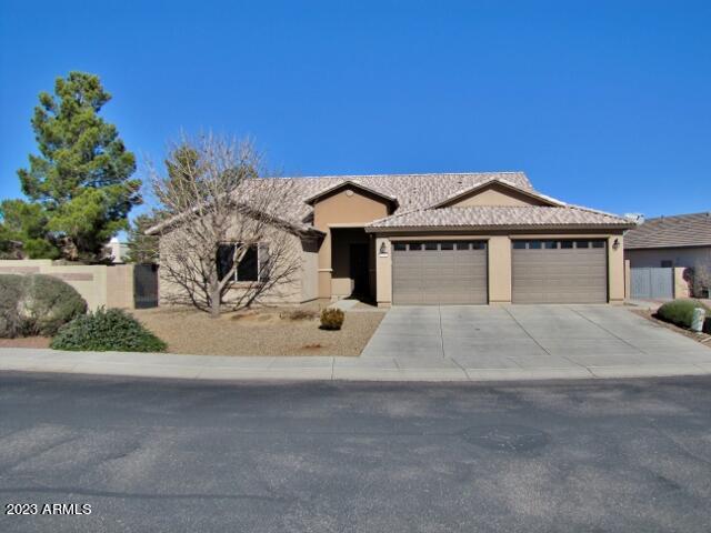 This 4BR+den/study/3BA/2CG, 2776 sq.st. home on a corner lot in the Holiday subdivision is centrally located in Sierra Vista, AZ minutes from Ft. Huachuca, shopping, schools and Canyon Vista Medical Center. The open floor plan includes a large great room, ceramic tile, modern kitchen appliances and split floor plan. The yards are fully landscaped with a beautiful lawn in the backyard with a play set. The clubhouse and community pools are just around the corner. Call today.