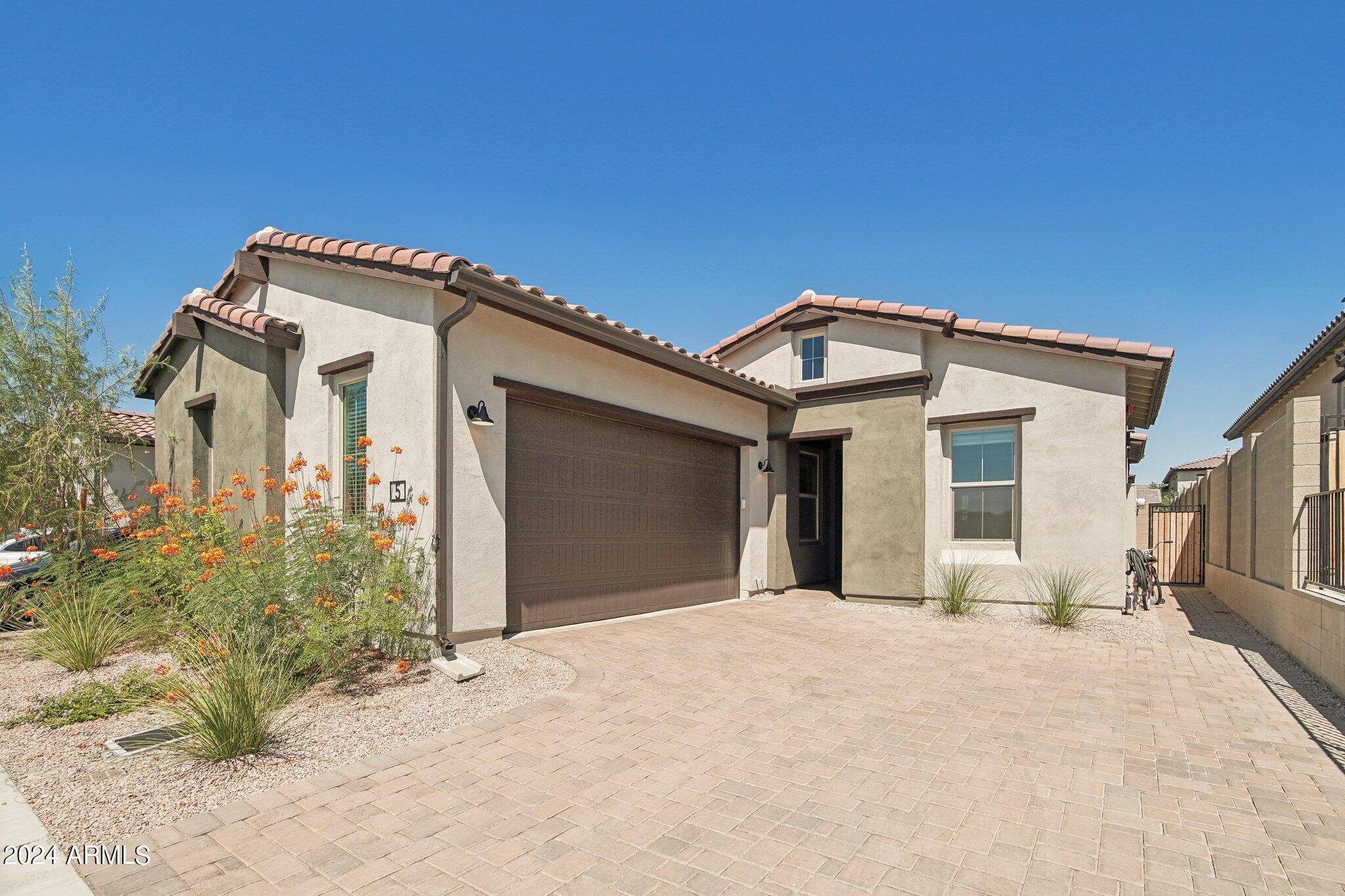 Experience resort-style living in the heart of Cave Creek with this stunning 3-bedroom, 3-bathroom home. Perfectly situated within walking distance to the vibrant town center, you'll have easy access to a variety of restaurants, shopping, and entertainment options. This home features an open floor plan with soaring ceilings, granite countertops, tile and carpet flooring, and new appliances. Enjoy the outdoors on your patio with a fireplace, just steps from the community pool. The community is rich with amenities, including a heated pool and spa, BBQ pavilion, fire pit, pickleball court, fitness center, and a dog park. This move-in ready home offers the perfect blend of luxury, convenience, and scenic beauty, making it an ideal retreat in one of Cave Creek's most sought-after locations.