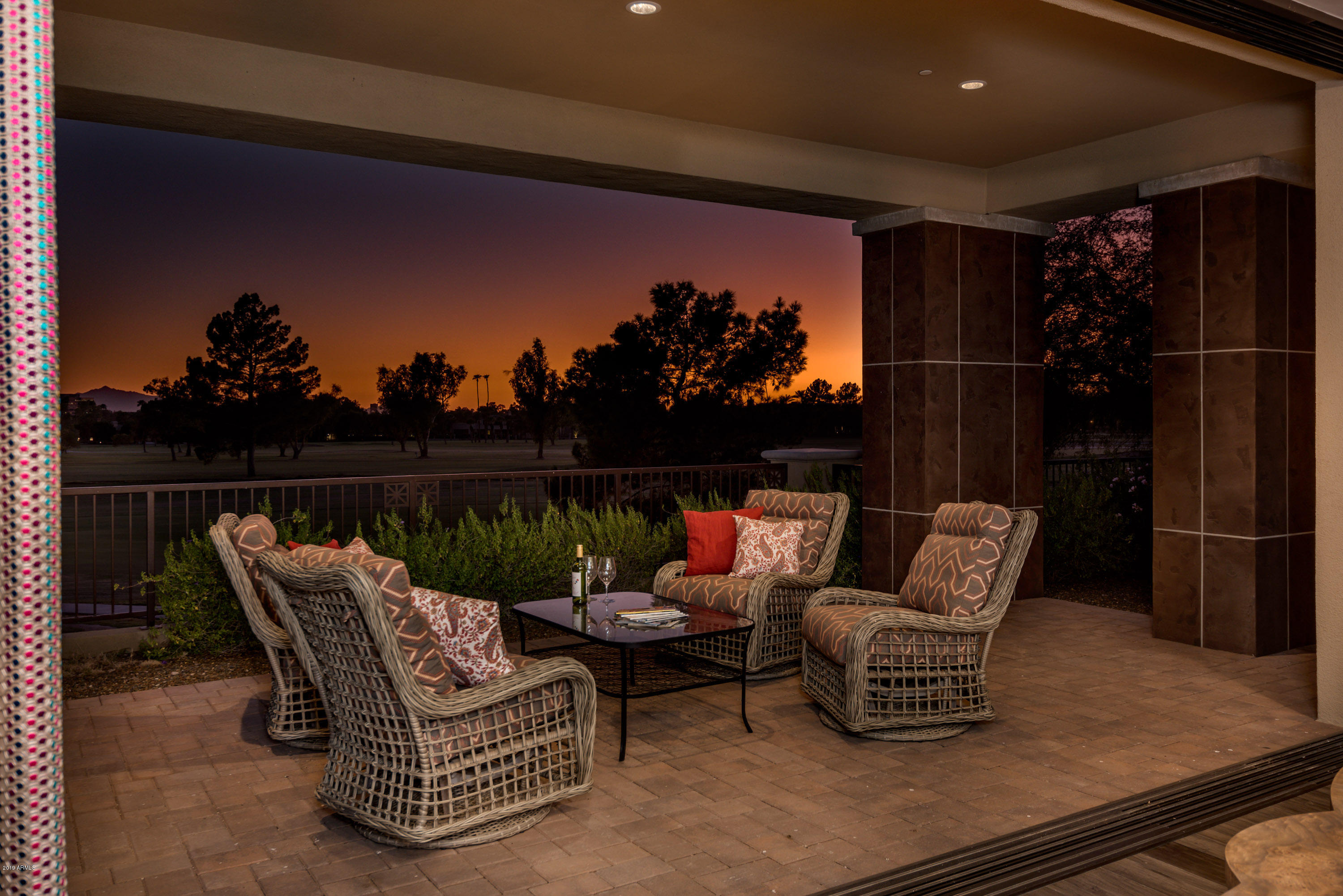 Experience exclusivity while being just minutes away from the historic AZ Biltmore, A Waldorf Astoria Resort. Situated on the Adobe Golf course, Two Biltmore Estates is nestled within the  prestigious Biltmore Circle. Filled with light, this soft contemporary home is made for the art enthusiast.  West facing and an entertainers dream, this home offers exceptional finishes with a unique style, curated from world travels, blended to create  a memorable experience.  Decor handpicked by designer Shellie Rudow of Shellie Rudow Interiors; this home is sure to impress. Crestron home system. Luxury kitchen appliances. Fully automated floor to ceiling sliding doors with auto sheers and black out shades. Enjoy beautiful Mtn, golf course and city light views. TOO MANY UPGRADES TO LIST!!!!!