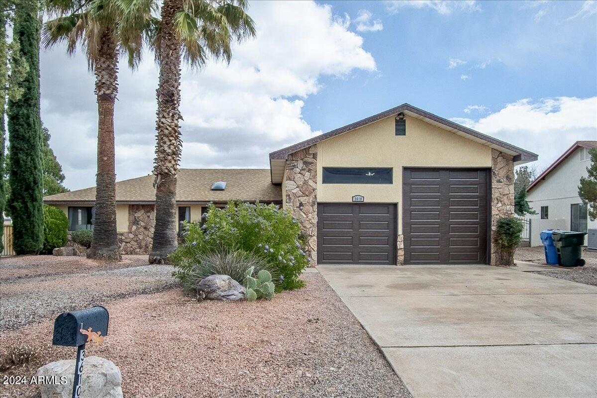 Spacious country club home that offers 3 spacious bedrooms, 2.5 bathrooms and 2 car garage with one side featuring RV height door. This home has had all the big upgrades completed! Fully remodeled kitchen, new roof, brand new air conditioner & furnace, 2 new water heaters, and both garage doors are brand new. So many big upgrades are completed and ready for you to make this your home. Inside the living room features vaulted ceilings with a fireplace, a new dining room area, and lots of storage. Enjoy the mountain views from your private backyard!