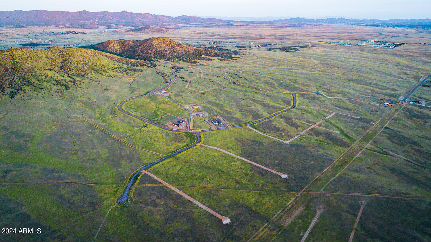 2+ Acres, Ready for Immediate Build in Prescott Valley's desirable Ventura Ranch. State-of-the-art underground water system + assured water supply, private, paved roads, private mailboxes, underground fiber optic internet by MTE and underground APS electric. Seller-financing available if desired. Ventura Ranch values community, as well as privacy, pride of ownership, and quality of life. Expert-designed landscaping, high-quality boutique street signage, and more is currently being installed. Beautiful, Prime Location in Prescott Valley, equestrian-friendly, expansive views, and conveniences close-by.