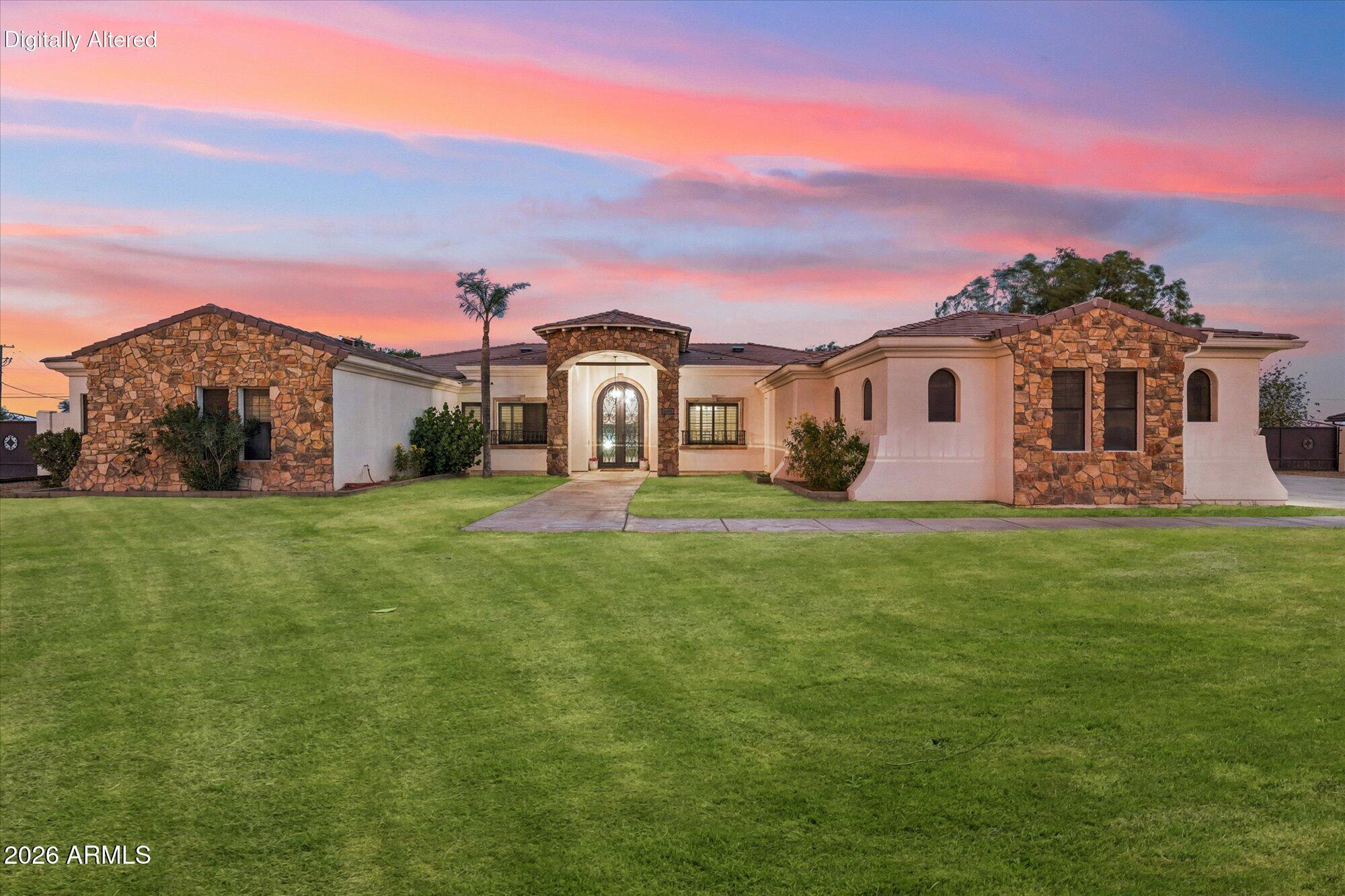Welcome to your Arizona dream home! Situated on a 1 acre lot with NO HOA, this custom estate features 6 bedrooms, 4.5 bathrooms, including a private mother-in-law suite with its own entrance. Enjoy tile flooring throughout, remodeled bathrooms, a spacious kitchen with abundant cabinetry and counter space, and a luxurious primary suite with dual vanities, a freestanding tub, and oversized his/her walk-in closets. Owned solar, two newer A/C units, new water heaters, solar skylights, a new 300-ft private well, and whole-home water filtration. Outside, you'll find a 6 car garage, 2 RV gates, RV hookups, horse stalls, a chicken coop, gazebo, fountain, covered patio, mature trees, and plenty of room for your RVs, boats, toys, entertaining and with the city amenities minutes away!