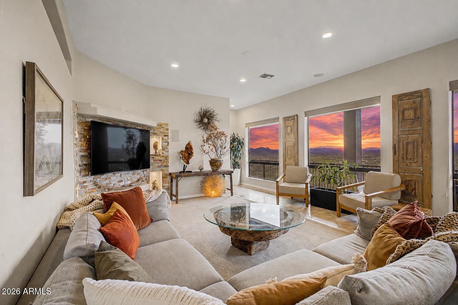 Mountainside Home! | PAID-OFF SOLAR, PANORAMIC CIRCLE MOUNTAIN VIEWS, POOL, 3-CAR GARAGE | This custom-built hilltop home was designed to maximize every inch of the panoramic Circle Mountain views that make it so special. Large dual-pane Low-E windows bring in natural light and scenic views across nearly every room while helping keep the energy bill down. The single-level layout offers flexible living spaces, a granite kitchen with island seating, and an owner's suite with bay window, walk-in closet, and soaking tub. A second main bedroom with its own bath adds flexibility. Out back, the covered patio, pool, and wide desert setting capture some of the best views in New River. Paid-off solar adds value, and a utility easement provides free internet while also paying the homeowner.