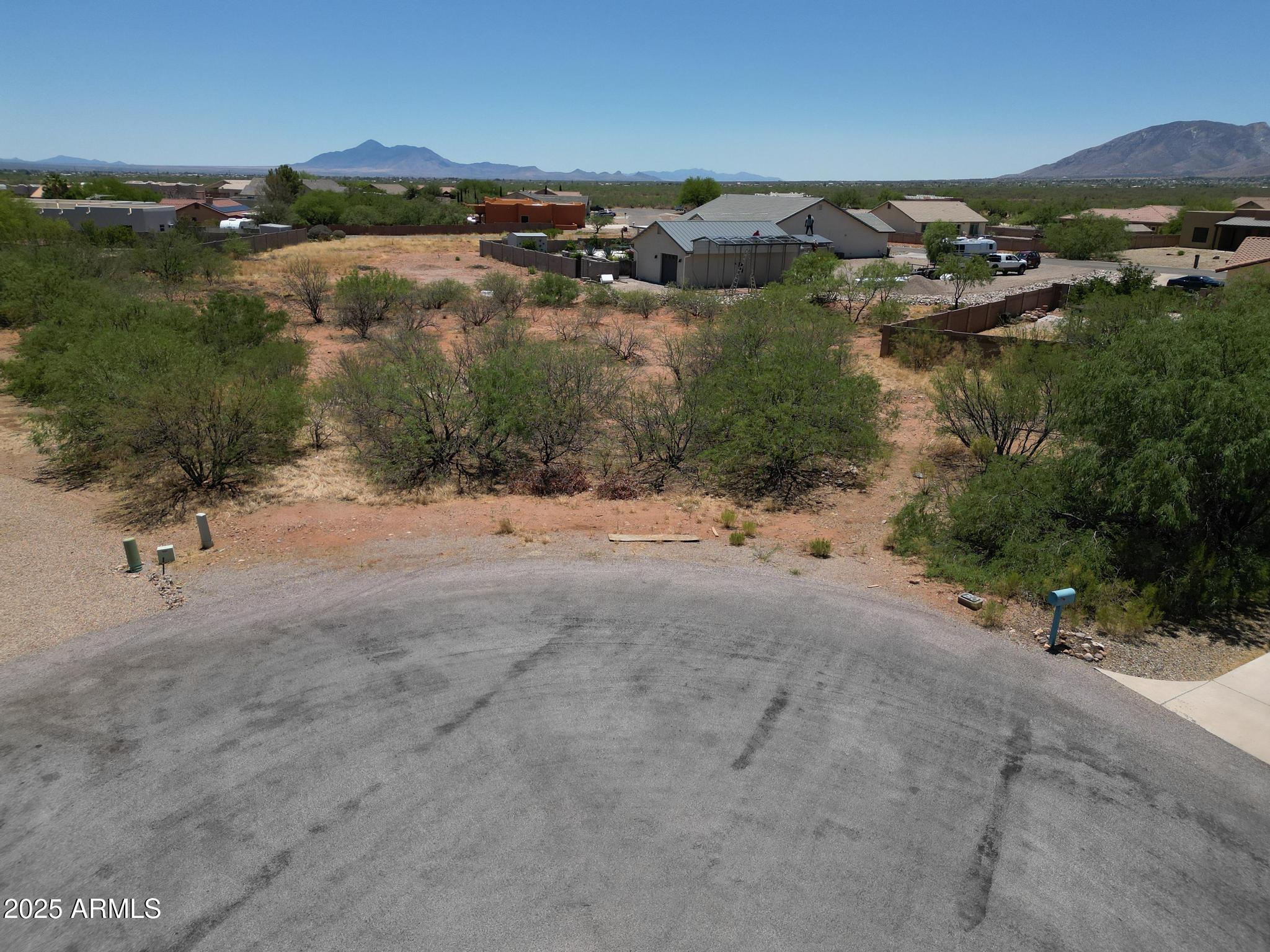 Build your dream home in the stunning Sierra Reserves Phase 2!
Lot 63 on Morning Glory Ct. offers .521 acres (22,712 sq ft) of natural desert beauty with breathtaking panoramic mountain views. Surrounded by native vegetation, you'll enjoy peaceful wildlife and bird watching in a serene setting that feels like the country—yet you're just minutes from Sierra Vista's city center and Fort Huachuca. This premium homesite combines tranquility with convenience, making it the perfect spot to create your custom retreat in one of Sierra Vista's most desirable communities!