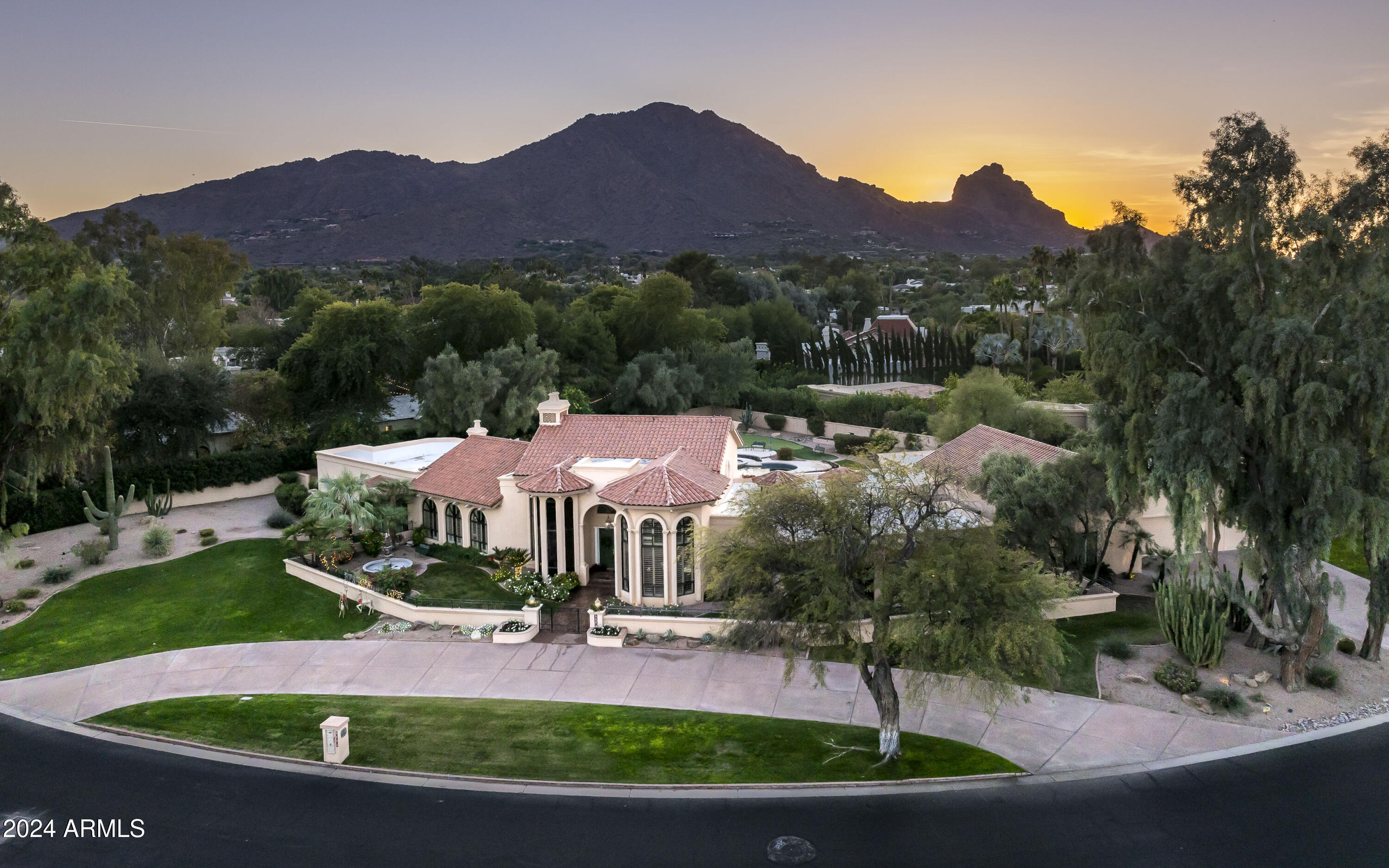 This is a once-in-a-lifetime chance to own a remarkable property in one of the most prestigious guard-gated communities in Paradise Valley—Finisterra. Perfectly situated on an oversized, quiet lot spanning just under 1.1 acres, this home offers views of Camelback Mountain and unparalleled privacy.

The existing residence features nearly 8,000 square feet of livable space, presenting endless possibilities. Whether you choose to do a light refresh or start anew, this lot provides the ideal foundation to build your dream home. Ideally located within the community, this property is one of the finest offerings Finisterra has to offer.

Don't miss this rare opportunity to create a bespoke estate in Paradise Valley's most sought-after enclave.