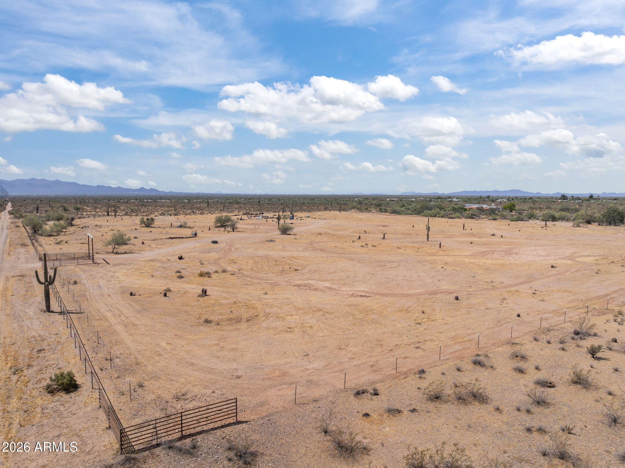Escape to wide-open space with this 4.81-acre parcel in Morristown, AZ--no HOA and endless possibilities. Enjoy peaceful desert living with beautiful views while staying within easy reach of shopping and amenities. Ready for your custom home, equestrian setup, workshop, or more. Four adjacent 4.81-acre lots are available, offering flexibility to expand. For aviation enthusiasts, a nearby 3-acre lot in the Thunder Ridge Airpark is also available, providing a unique opportunity to live close to a private airstrip. Build your vision in this growing area . if buyer was to purchase the additional acreage in the airpark, you cannot access it through these parcels, you must drive around through the airpark. Owner has re-surveyed property but is not currently recorded