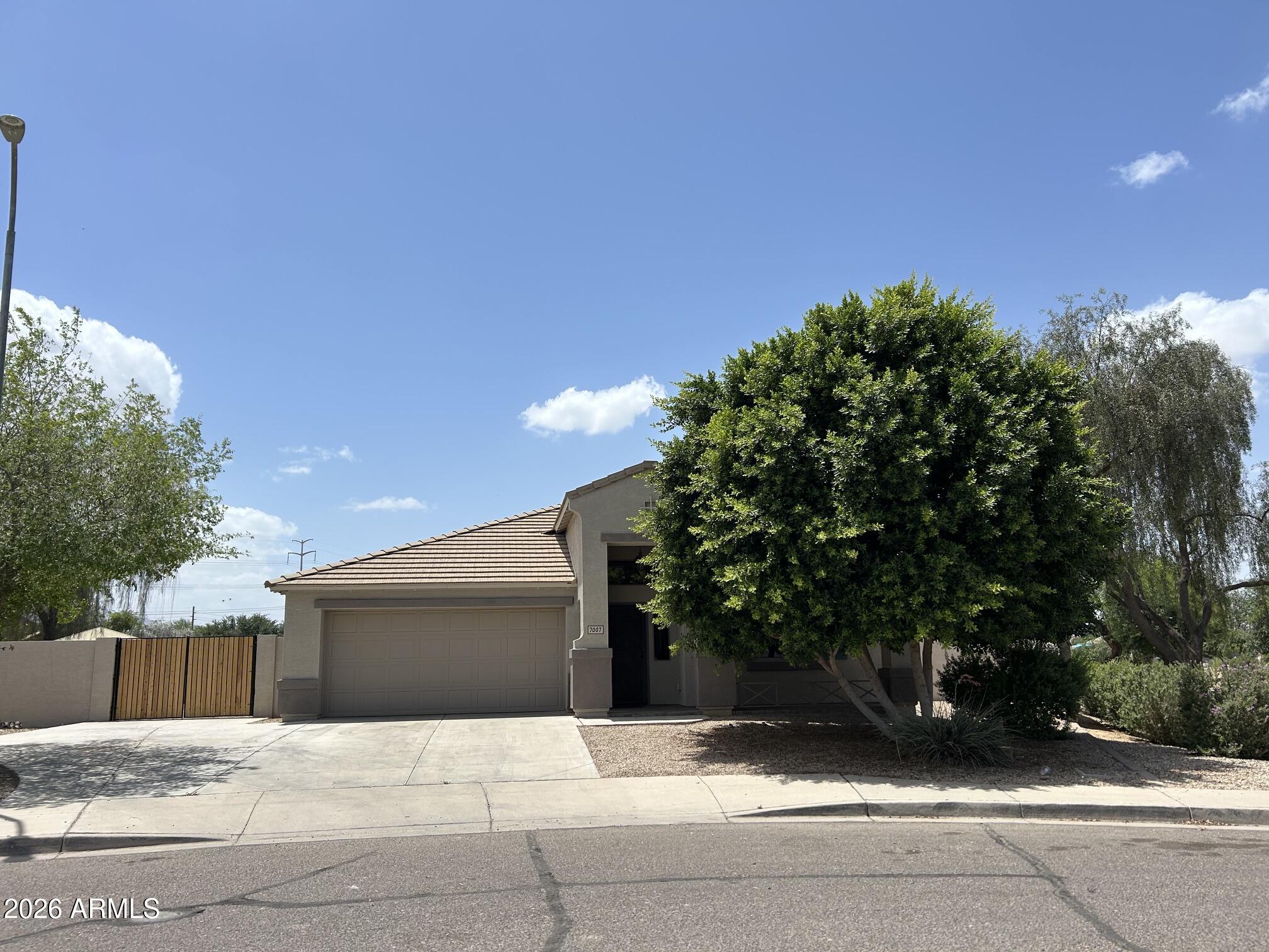Easy to fall in love with this beautifully maintained and recently updated ''smoke-free'' single story 3 bed, 2 bath, 2,146 sq.ft. home.  Offering exceptional value compared to new construction. All big-ticket items have been done in the past 2 years or less: 5-Ton AC with electromagnetic filters and programmable thermostat, hot water heater, stainless steel refrigerator, electric stove with double convection ovens, dishwasher and built in microwave. Fresh interior and exterior paint, new carpet, and porcelain tile flooring make this home truly move in ready.
Sitting on an expansive 15,000 sq.ft. lot, the property offers rare privacy with no neighbors on two sides and a community greenbelt bordering the other. Block and view fencing define the space while preserving openness.
The 20'-8" x 19' x 8' high Garage offers ample parking space for a full-size truck.  Outdoor living shines here. A unique toy corral provides secure space for work trucks, ATVs, trailers, or extra storage. Additional fenced areas create a grassy play yard for kids and pets, separate from the entertaining area with gazebo.
Inside, the kitchen features an island, dedicated beverage bar with wine cooler and walk-in pantry. The flexible formal dining room can easily convert into a den, office, 4th bedroom, or bonus room.
Homes like this rarely come available in such a desirable neighborhood--don't miss your chance.