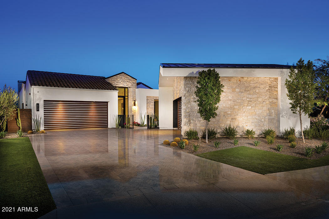 Welcome to Azure by Shea Homes, a luxurious guard gated community where beautiful sunsets and gorgeous mountain views blend harmoniously with the modern and transitional architecture.  This 2 time award winning modern home is located on the best of the best homesites.The stunning interior features an outstanding chefs kitchen with Gaggenau appliances, quartz counters and modern distinctive cabinetry. The interior is grand yet intimate and flows magically throughout. The main bedroom and bath will leave you inspired after relaxing in pure luxury. Outdoors you'll be greeted by the most spectacular pool that is the epitome of modernism set amongst professionally manicured mature landscaping. Outdoors you'll even find Infrared Patio Heaters for the cooler days. This is an absolute dream home.. with a near endless list of convenience features, that is perfectly located in the guard gated community of Azure.