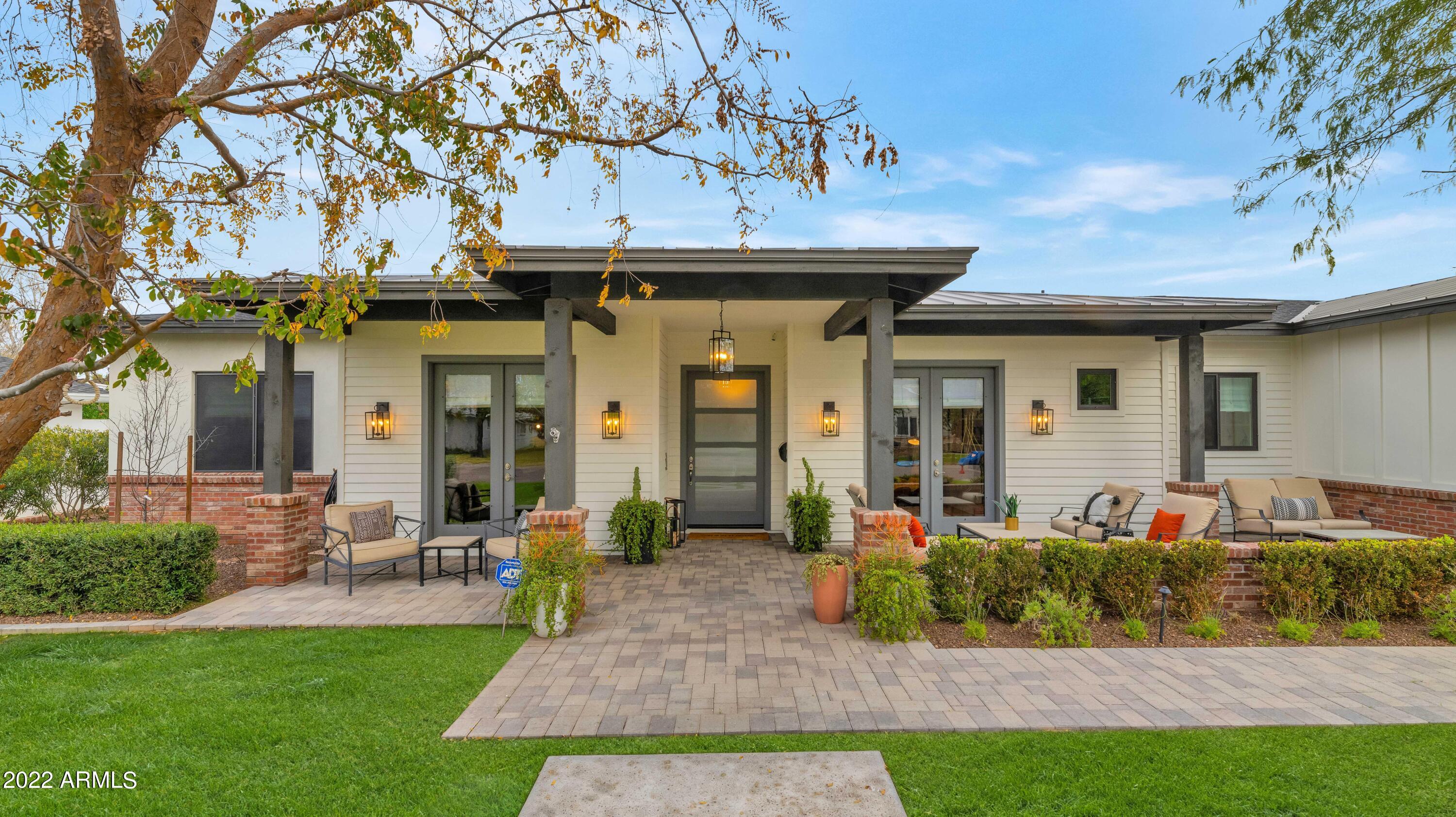 Exquisite open floor plan home built in 2017, 4 bedrooms, 4.5 baths, playroom and office with 3 car extended garage. Beautiful European Oak hardwood floors, contemporary fireplaces for those chilly AZ evenings, built-in cabinets on TV wall, & wainscoting and custom trim work throughout. AZ living at its finest on this half acre North/South facing lot with built in speakers, citrus trees and always shaded patio. Backyard features regulation bocce ball court, shade ramada with misters, large grassy area, heated salt water pool and spa with pool basketball hoop. Kitchen features large center island, quartz countertops and backsplash, Thermador appliances, farmhouse sink, wine cooler and beverage drawer, walk-in pantry, & plethora of storage. Perfect home for entertaining. Generous sized secondary bedrooms with custom personalities, walk in closets & upscale baths. Grand master retreat boasts crown molding, custom trim accent wall, French doors to patio, & barn door entry into spa-like en suite. Huge walk-in closet. Large laundry room offers sink, counter space and lots of storage. Amazing location close to a variety of dining options, shopping, golf and quick commute to freeways. See Documents Tab for full list of upgrades and features.