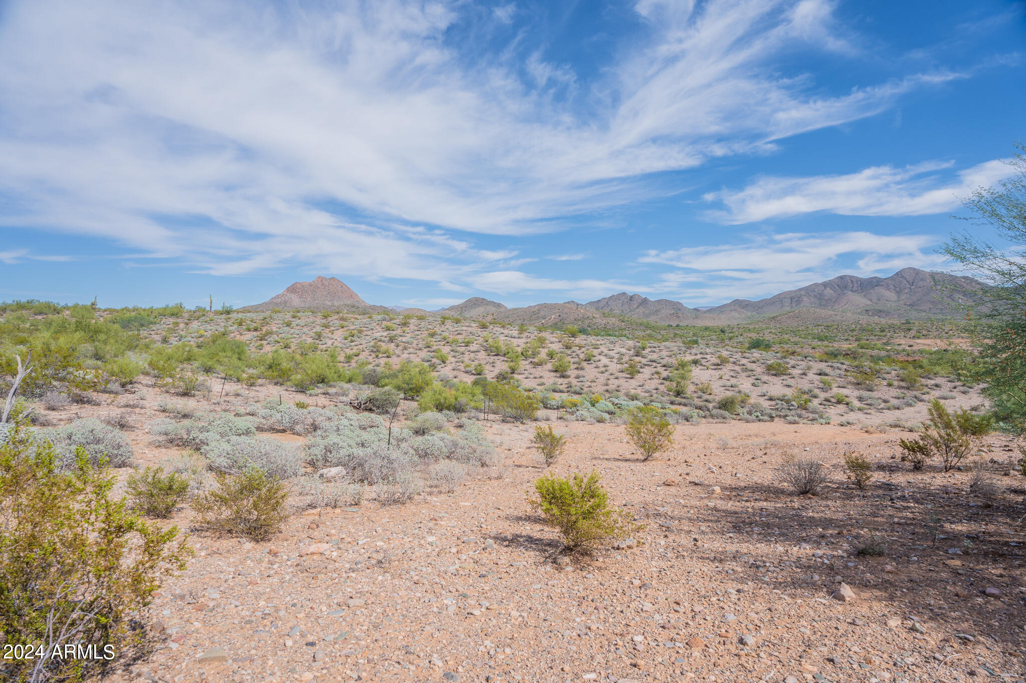 Incredible opportunity to own a 2.44 acre land lot with breath taking views. Easy access to the I-17 for those who commute. This property can be enjoyed in multiple ways including subdividing into multiple parcels. All utilities on site and sewer available. Community offers: a park with playground, basketball hoops, grassy volleyball court, walking trails, and green belt area. Great investment opportunity.