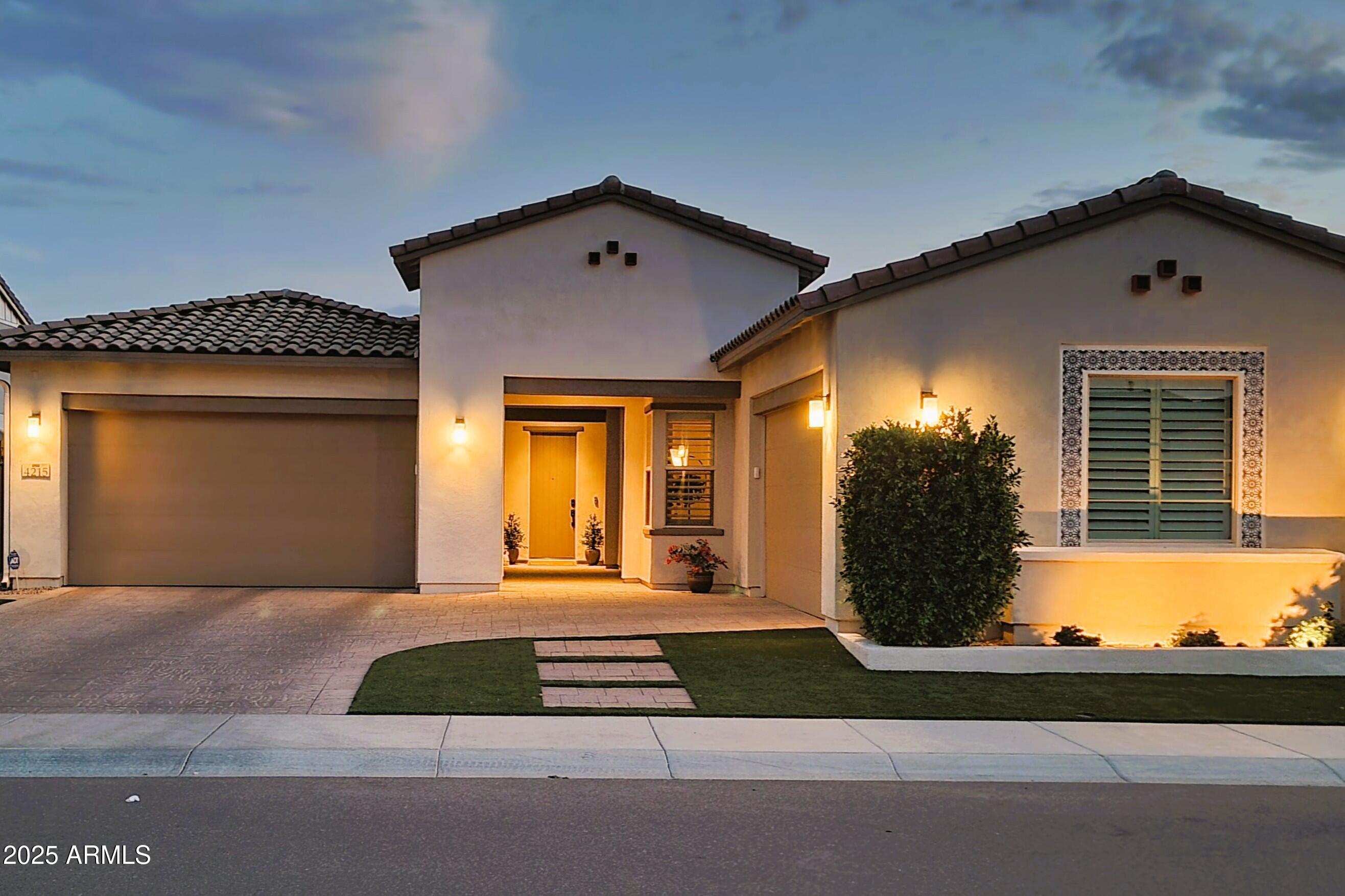OVERSIZED 4 CAR GARAGE. Situated just outside the picturesque Veteran's Oasis Park and nestled within the highly desirable, gated community of Canopy, this remarkable home embodies unparalleled elegance and contemporary convenience. It seamlessly combines grandeur and comfort, meticulously designed to cater to the needs of the most discerning buyer. The home boasts 5 bedrooms, 4 full bathrooms, a bonus room and den and is outfitted with state-of-the-art technology. And the 4-car garage is oversized to fit all the toys!! With shutters throughout, 10 ft ceilings and well-appointed designer features, this home won't last long.