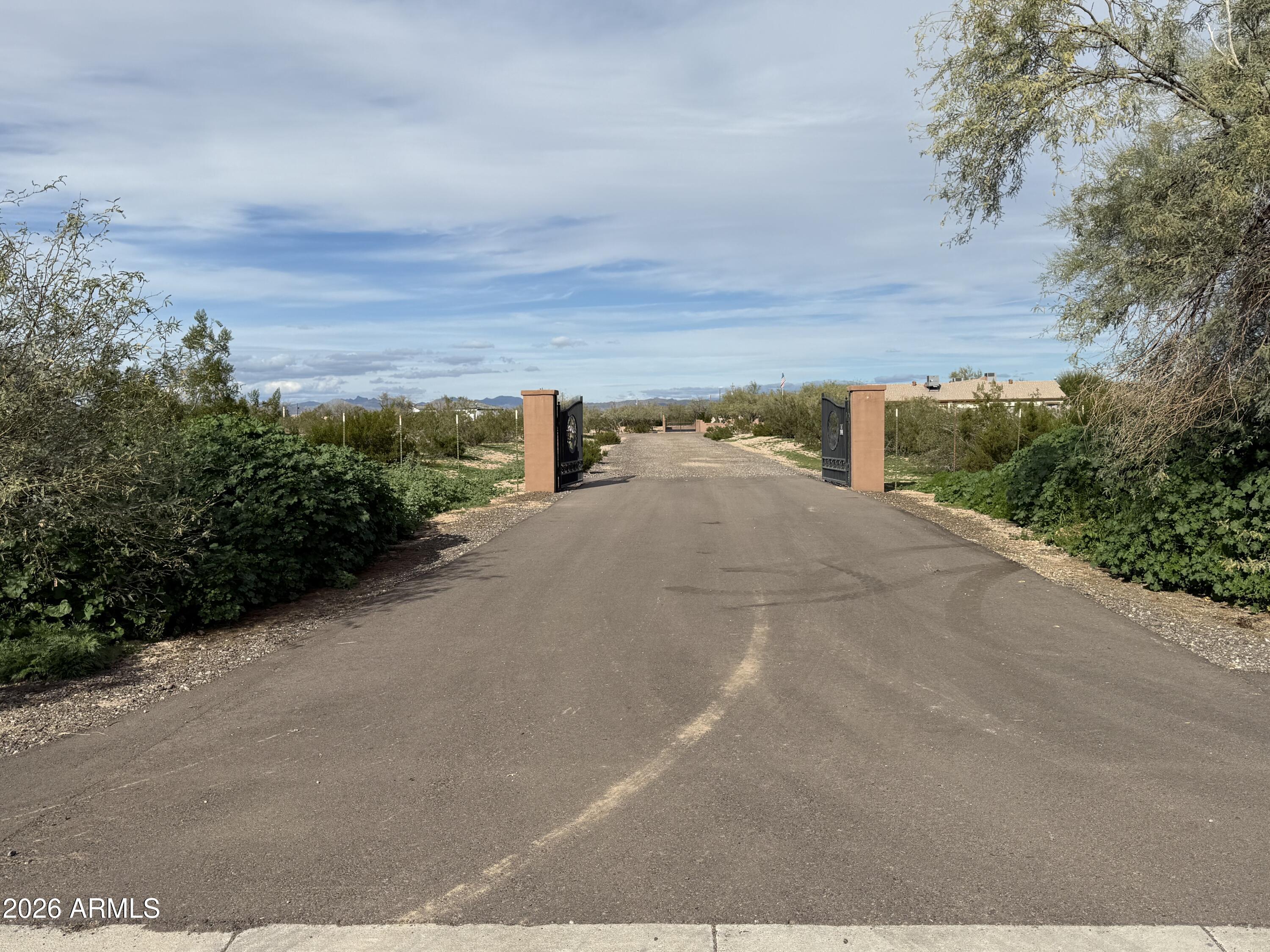 Developers Welcome!! Come and get this AMAZING 2 acre parcel that is located in a private cul-de-sac located on Dynamite Blvd! Dynamite and 176th Avenue are both paved with new growth, custom homes, subdivisions, and support facilities are quickly building out this area of the Northwest Valley. This private cul-de-sac has power/water inside this quiet little spot. This lot will be split in escrow. Get it now before it's GONE!