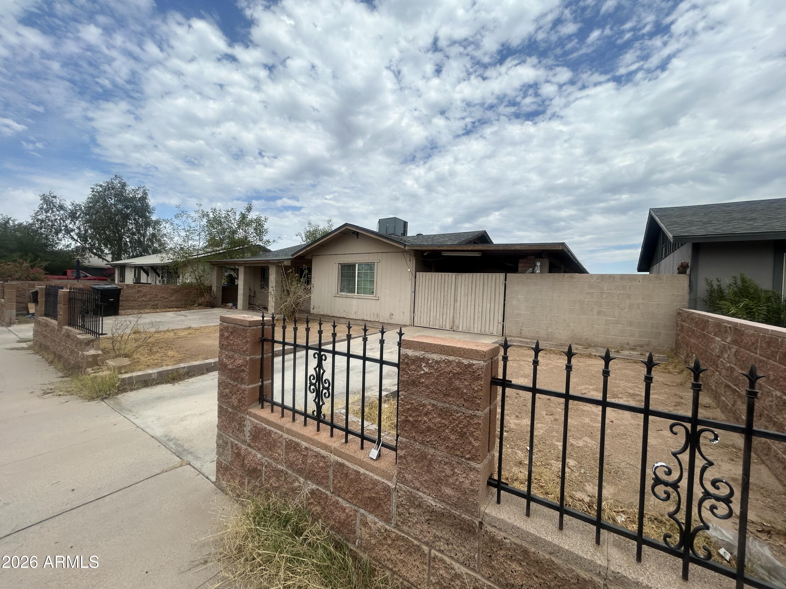 Investor Special with Endless Potential! Don't miss this incredible investment opportunity in a prime location and no HOA. This home is ready for your personal touch and offers endless possibilities for investors, flippers, or buyers looking to build equity. While it needs a little TLC, many of the major updates have already been completed, including a new roof, new A/C unit, and new windows. Situated just a street away from Tempe, this home offers unbeatable convenience with easy access to all major freeways, shopping centers, dining, and entertainment. The spacious backyard features a large covered patio, perfect for outdoor living and entertaining, along with a covered carport for added convenience. Best of all, all appliances are included, making this an even greater value