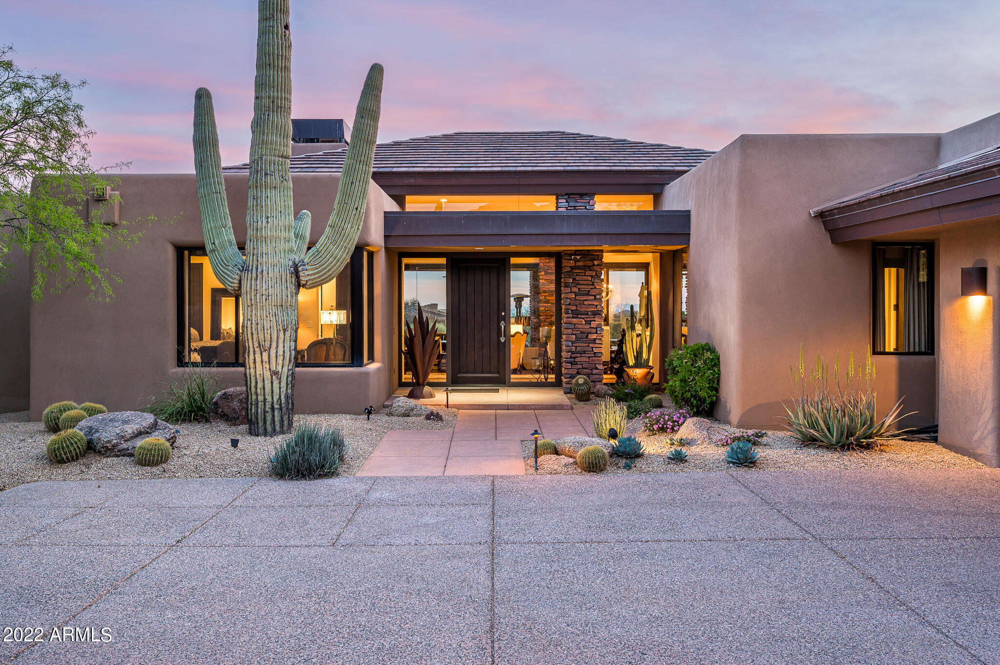 You must see  to believe the stunningly elegant remodel of this Desert Hills home in the sought-after Desert Mountain community***Golf membership available from seller with no wait list***Designer selections of  lighting, wood flooring, cabinetry, and white marble/ limestone slabs with beautiful accent tile; all provide a luxury package you will not want to miss!*** Located on a homesite that takes advantage of a sunny southern exposure featuring resort patio with sunset and city light views***All with the advantage of Desert Mountain Club's active desert lifestyle of private golf, tennis, pickle ball, including 7 courses, 10 restaurants, health spa & fitness center, 20+ miles of scenic hiking trails and a myriad of other year-round activities. Membership through 30-day club  application