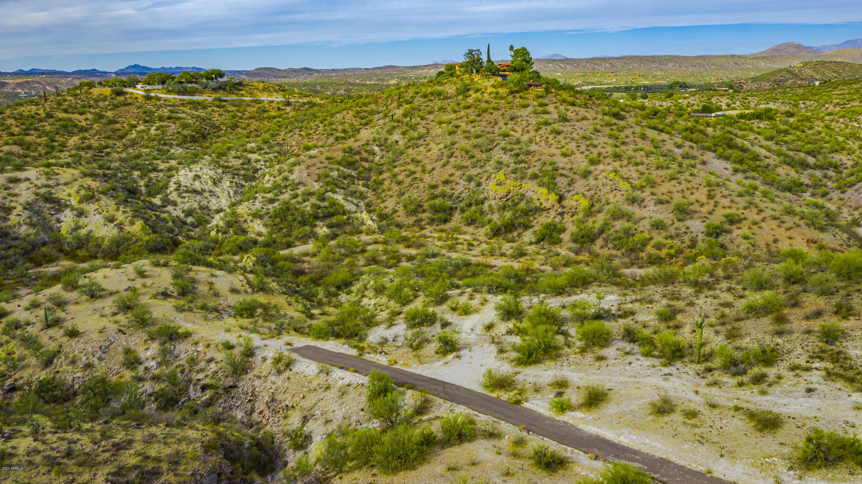 THIS IS OUR HIDDEN JEWEL IN WICKENBURG *SERENE PEACE AND QUIET *HORSE PROPERTY *CLOSE TO BLM LAND *MINIMUM ACREAGE 4.02 AND MINIMUM SQ FT 2400 SQ FT *EXCLUSIVE ELEGANT HOMES IN THE AREA A MUST SEE