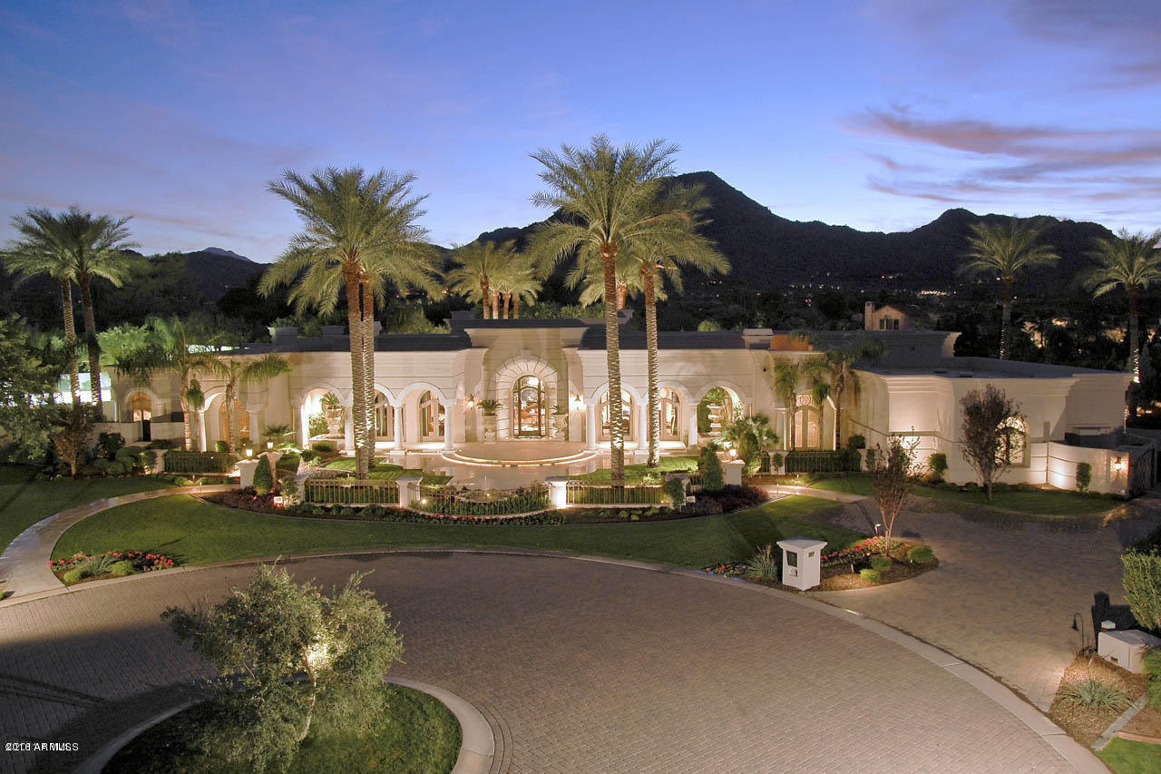 now $4,850,000 just reduced $700,000- cost  $10 Mill to build!! This incredible 13,000 sf estate, on ONE LEVEL with a transitional style and huge MOUNTAIN VIEWS, sits on 1.8 ACRES in the exclusive GATED Villaresi enclave. Enter the front door and be absolutely wowed as you see thru the elegant living room's 40 FT GLASS DISAPPEARING WALL to the dramatic 50 ft resort pool! Fabulous amenities include a sunken lit tennis court,very expansive grass lawns, wide gallery hallways, 5 disappearing glass walls, a media rm, 2 libraries, 7 bedrms including 2 masters, 2 guest homes + a 3,000 sf master with makeup, massage rm and 26'by 22'gym! A smart home- over $100,000 in electronics recently upgraded! The home boasts the finest and most expensive finishes! BEST BUY IN PV!
SELLER SAYS SELL!