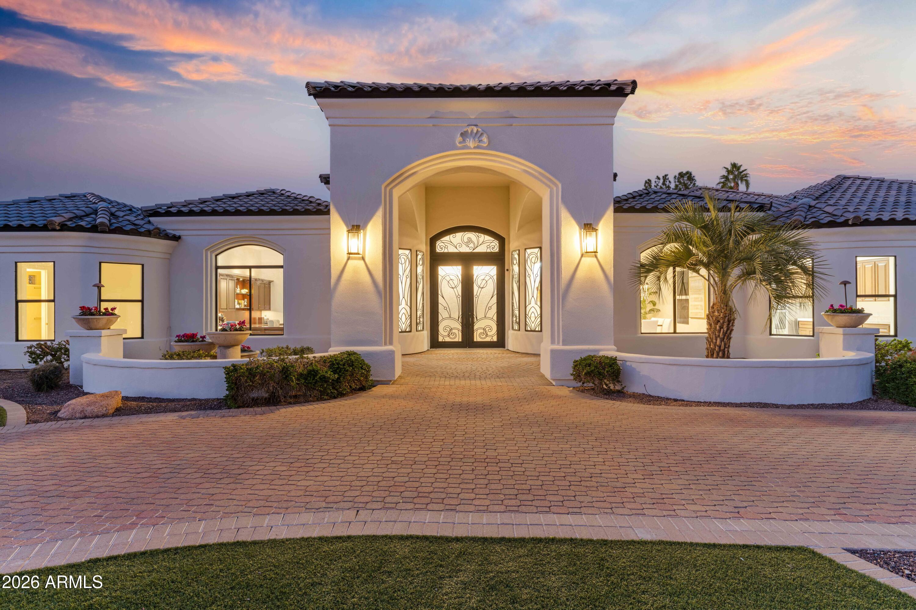 A rare opportunity to claim your piece of paradise in the heart of Paradise Valley. Located within the exclusive, gated Cheney Place community on a prestigious, private interior nearly one-acre lot, this single-story luxury residence offers a seamless blend of privacy, sophistication, and convenience. Ideal north/south exposure fills the home with natural light, while soaring ceilings and an open, flowing layout create an inviting setting for everyday living and entertaining. The resort-style backyard provides a tranquil retreat—perfect for hosting or unwinding with Camelback and Mummy Mountain nearby. Just minutes from Scottsdale Road, enjoy easy access to Old Town, North Scottsdale, dining, shopping, golf, medical facilities, and the Scottsdale Greenbelt. A truly exceptional offering!