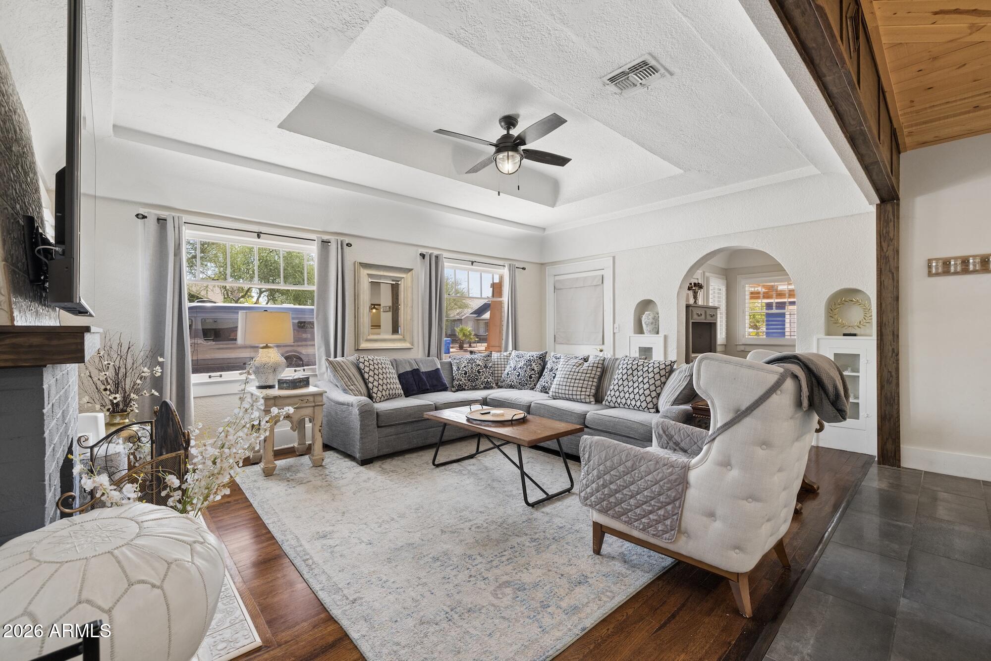 This charming 1928 brick home is ready for new owners! Fully remodeled and loaded with character, this Coronado Historic District gem showcases original hardwood floors, tall baseboards, arched doorways, coffered ceilings, and a wood-burning fireplace, while offering the modern upgrades buyers want including newer plumbing, electrical, HVAC, roof, and insulation. Cool off in the newly built pool or relax knowing many of the major systems have already been updated. The real showstopper is the fully permitted casita- perfect for guests, multigenerational living, a home office, or rental income potential. Owner-occupants may benefit from Historic Tax Classification, offering approximately 50% property tax savings. Walk or bike to local favorites, restaurants, coffee shops, museums and parks!