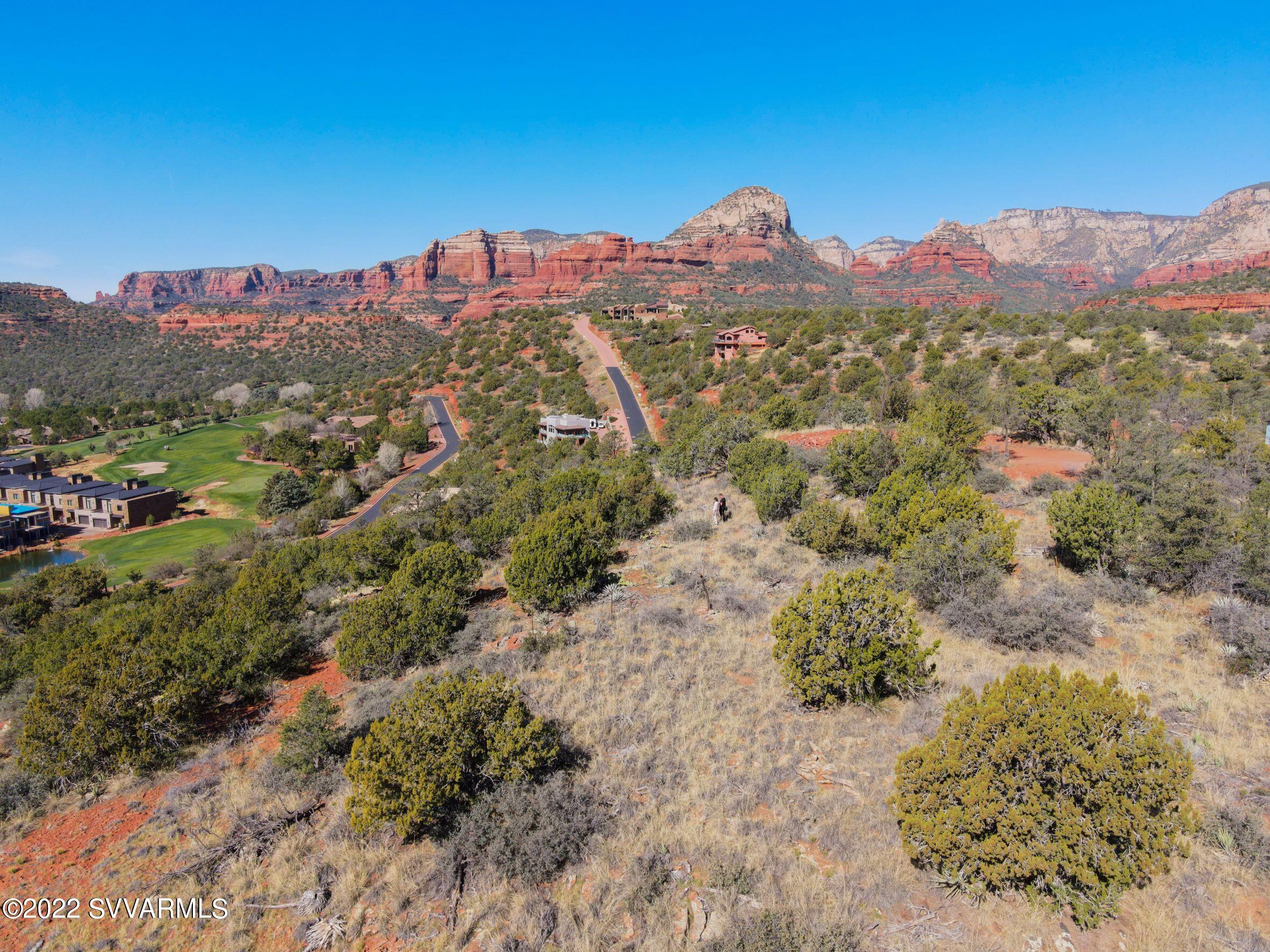 Looking for 360 degree Red Rock Views?  These stunning Hilltop homesites, sold together, are located in the desirable Seven Canyons gated community. Encompassing a hillside overlooking the club these sites have views encompassing Wilson Mtn., Thunder Mtn. and surrounding private vistas.  Embrace the unlimited possibilities to design your custom Sedona dream home with over 3 acres  backing to the Natl. Forest.  If you are dreaming of an indoor/outdoor home with spectacular vistas this is the site.  Subdivision has HOA and design guidelines.  Plat and other details available through listing agent.