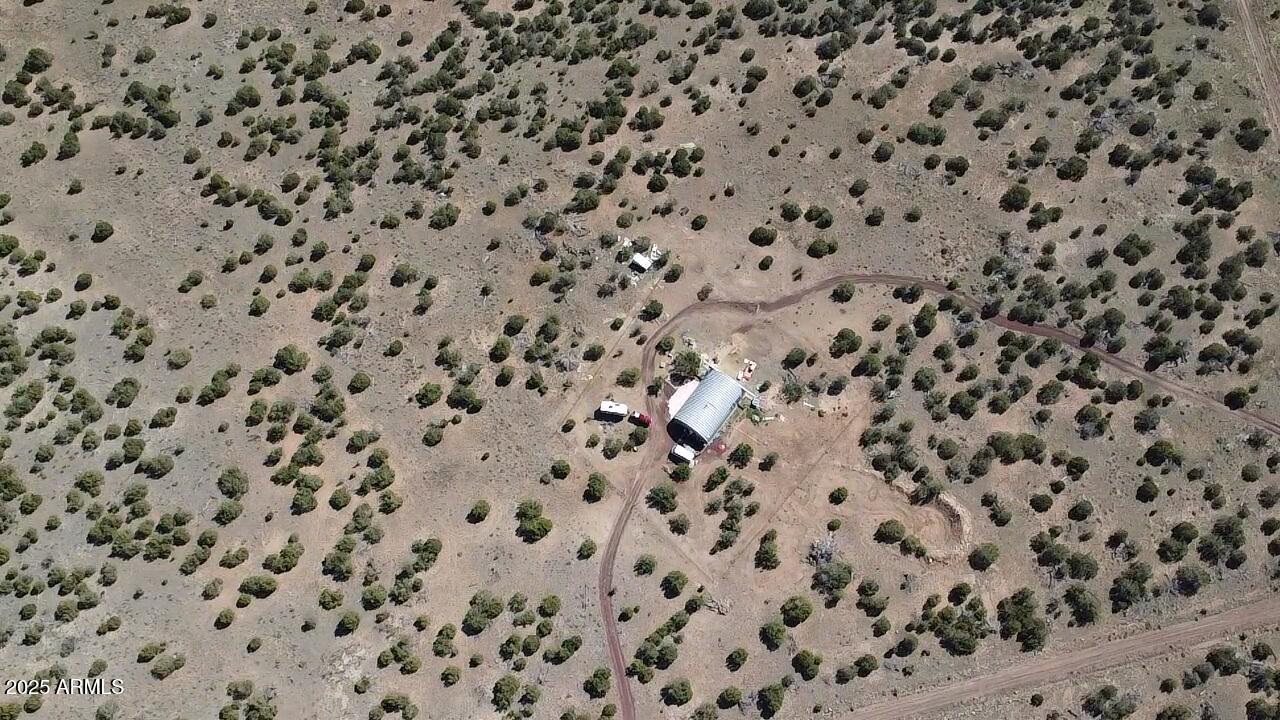 ***MASSIVE VALUE!!!***16 ACRES WITH 1-ACRE FULLY FENCED!!! * 14,000 DOLLAR BUFFALO BARN FENCE PROFESSIONALLY INSTALLED * OFF GRID (50X40) QUONET HUT HOME WITH SOLAR POWER, 2 1300 BURIED WATER CISTERNS & 1200 GALLON SEPTIC * SECOND LEVEL WAITING TO BE FINISHED * NEWER WOOD STOVE * 8 SOLAR PANELS W/12 & 24 VOLT SYSTEM * 2 PROPANE HEATERS * INTRICATE WATER CATCH SYSTEM * 2 250 GALLON WATER TOTES * 20 YARDS OF LAYED GARDENING DIRT * FURNISHED *