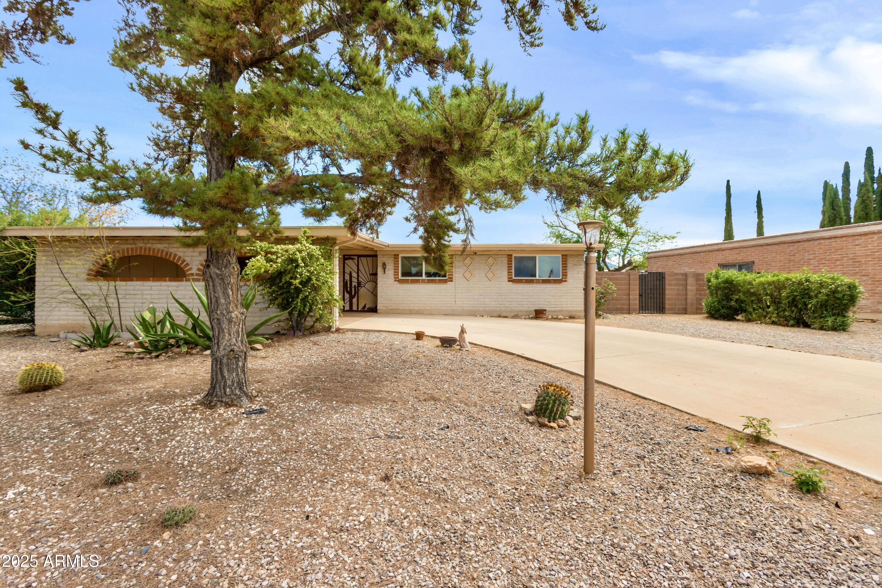 Motivated Seller - Don't Miss This Opportunity!
Step into this inviting 3-bedroom, 2-bathroom home! Enjoy a spacious dining area, two cozy living rooms, a warm wood-burning fireplace, and easy-to-maintain tile flooring throughout the main areas.
The fully fenced backyard offers privacy and includes a handy storage shed, while the large carport provides ample parking. An enclosed back patio adds extra space to relax or entertain year-round. 
Recent upgrades include a new furnace and water heater (2022) for added peace of mind. Tucked away on a quiet street, yet just minutes from town—this home perfectly blends convenience and tranquility.